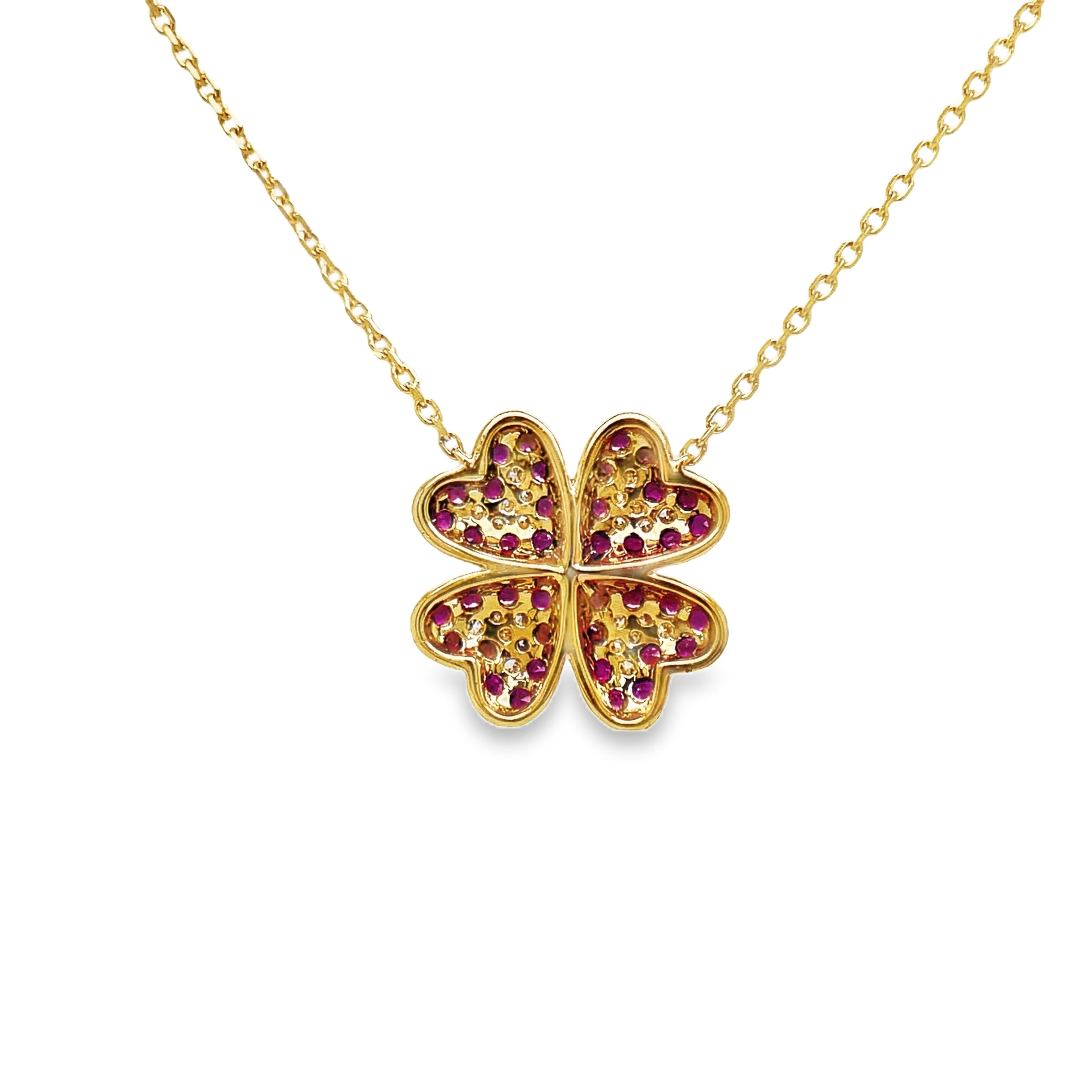 Exude elegance with our Four Petal Ruby and Diamond Pendant Necklace. Adorned with stunning round rubies totaling 0.95 cts and shimmering round diamonds totaling 0.16 cts, this 14k yellow gold necklace boasts a sophisticated four petal flower design. Elevate your style and make a statement with this exclusive piece.