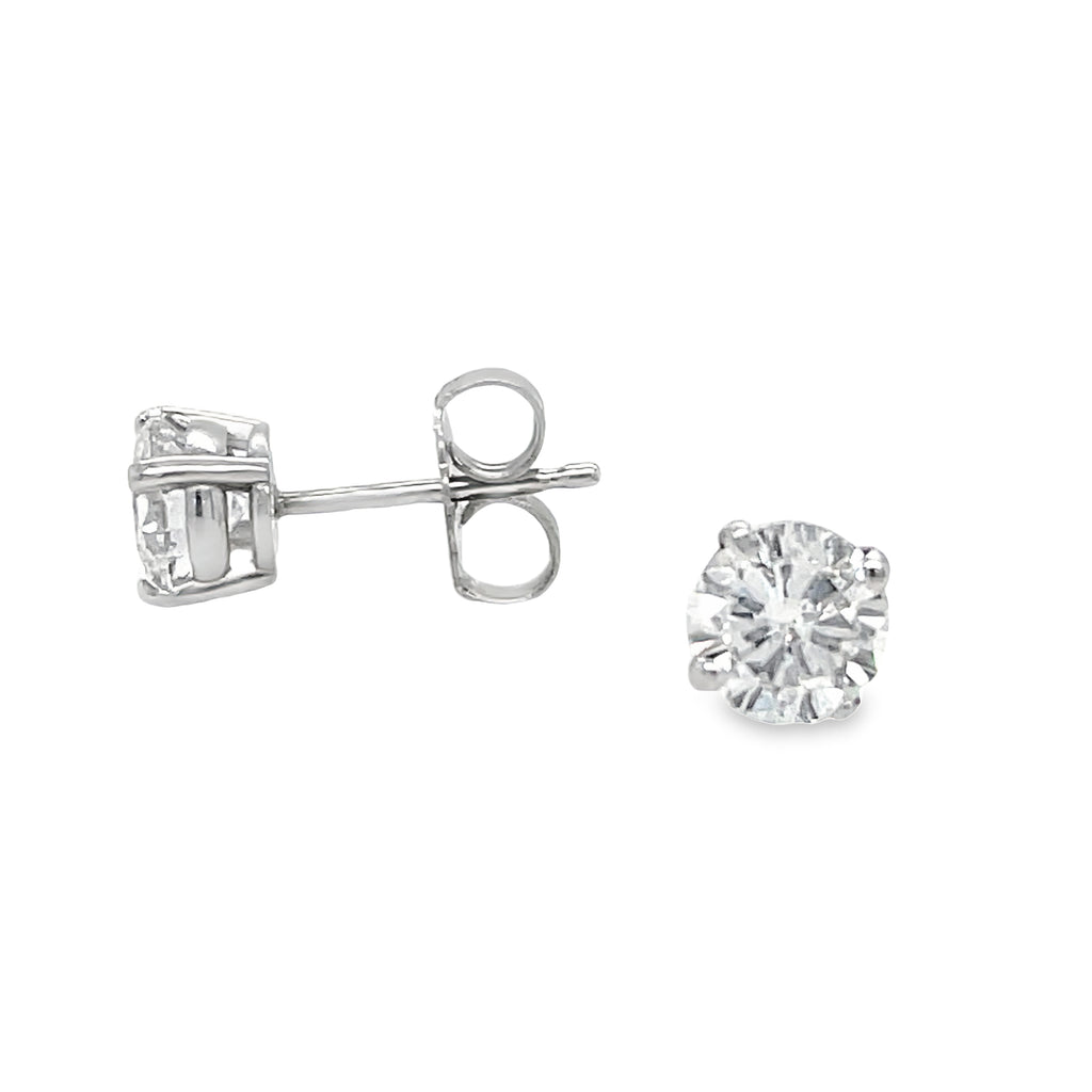 Elevate your style with our exquisite Diamond Stud Earrings! Crafted with two round brilliant diamonds, basket set in sleek 14k white gold, these earrings exude timeless elegance. Showcasing G color and SI1 clarity, they're the perfect addition to any jewelry collection. Order now and shine bright like a diamond!