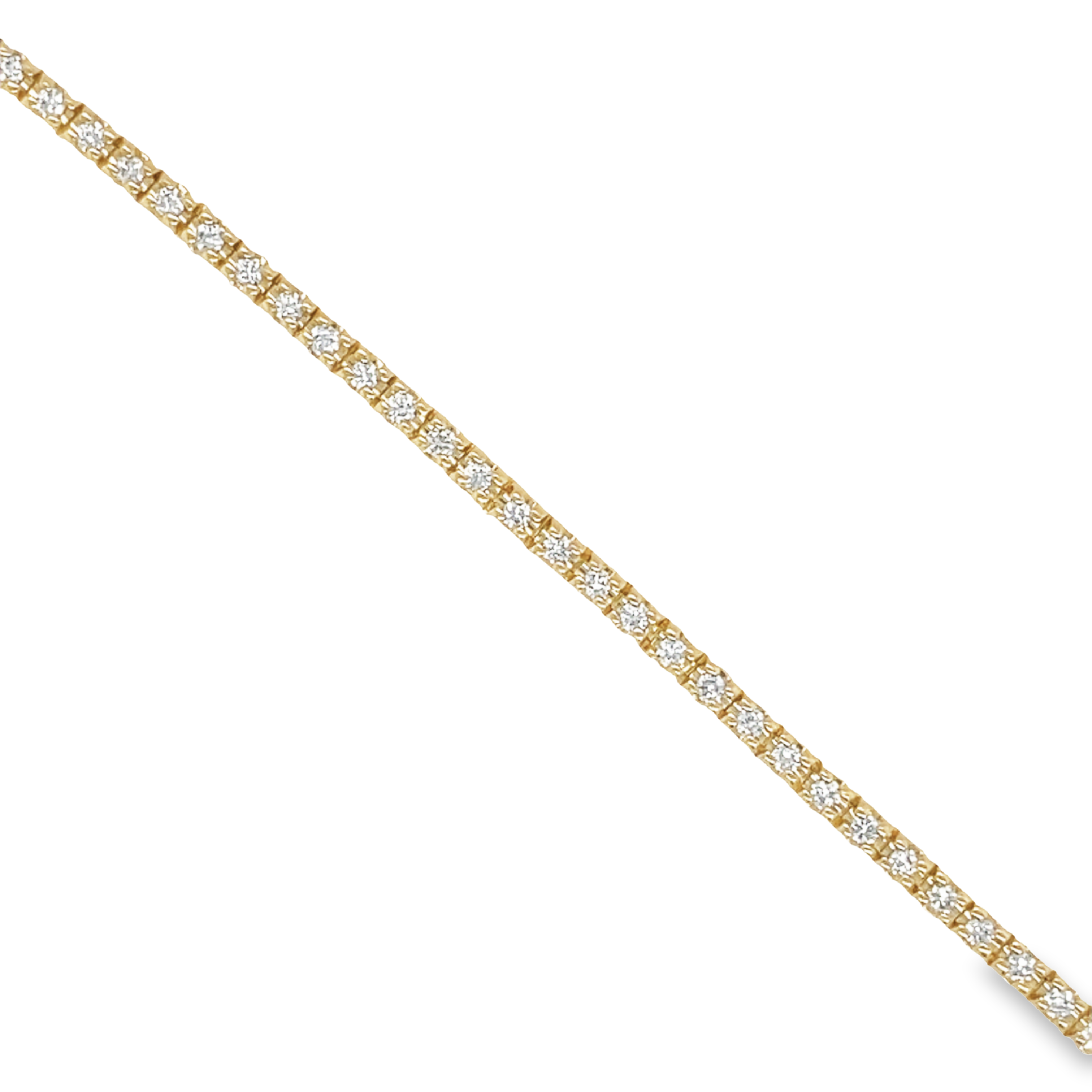 This Diamond Line Tennis Bracelet is set in 14k yellow gold and features a sparkling 0.88 ctw of diamonds with good color and clarity. Its sophisticated design makes it easy to stack with other pieces and wear to any occasion.