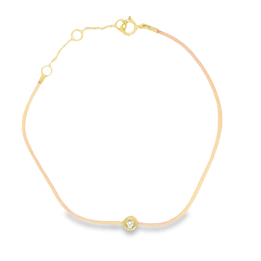 Indulge in the luxurious sparkle of this Dainty Diamond Solitaire Orange Silk Bracelet. Boasting a single bezel-set diamond set in 18K golden yellow gold, this adjustable bracelet creates an unforgettable look. The adjustable silk cord ensures a perfect fit every time. Enjoy the shimmer and shine of this lavish piece.