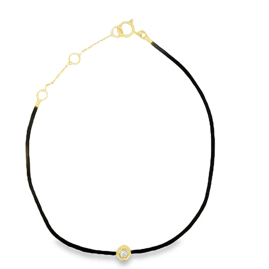 Top view of fastened 18k Yellow Gold Dainty Diamond Solitaire Black Silk Bracelet