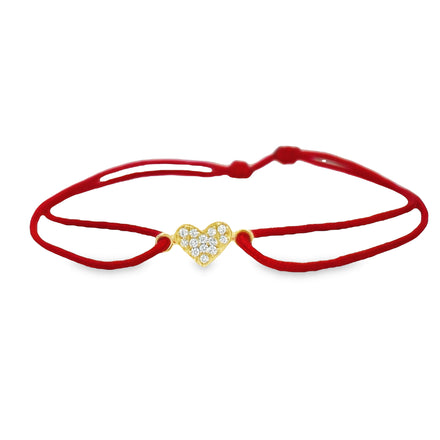 This one-of-a-kind Dainty Diamond Heart Silk Bracelet will take your breath away! Crafted with an 18k yellow gold heart and an adjustable silk cord, it's luxurious and timeless. Sparkling with a shimmering 0.05 ct diamonds, it's perfect for any special occasion!