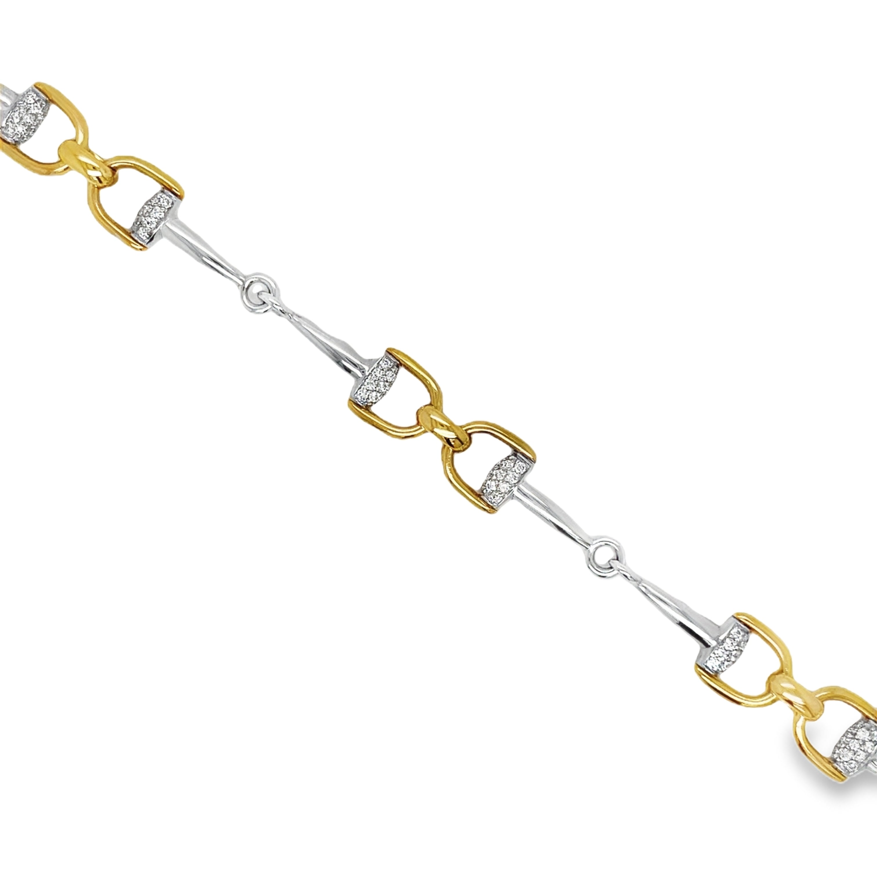 Indulge in luxury with our 18k Italian Yellow Gold Horse Bit Link Bracelet! Made in Italy, this everyday accessory is perfect for easy stacking and adds a touch of elegance to any outfit. Set in a flawless 18k yellow gold mounting and round diamonds 1.15 cts with secure clasp. Its versatile 7-inch length with sizing loops ensures the perfect fit. Elevate your jewelry collection with this exquisite piece!"