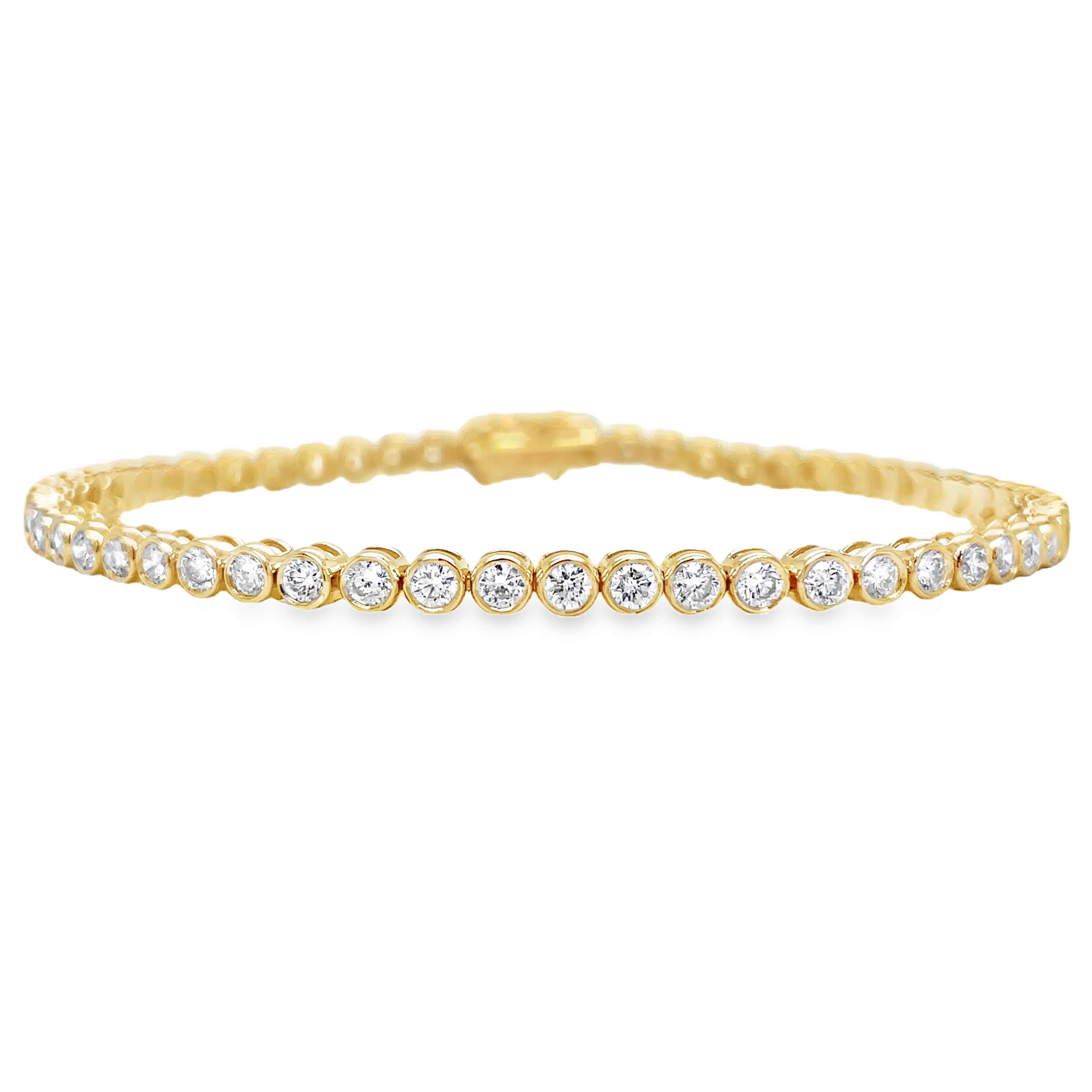 his luxurious 14k yellow gold bracelet features 2.92 carats of round diamonds, each expertly bezel-set for added sophistication. With a color rating of G/H and a clarity rating of SI1, this bracelet is truly a masterpiece. The double figure eight design adds a touch of elegance to this already exclusive piece. Elevate any outfit with this stunning bezel diamond tennis bracelet.