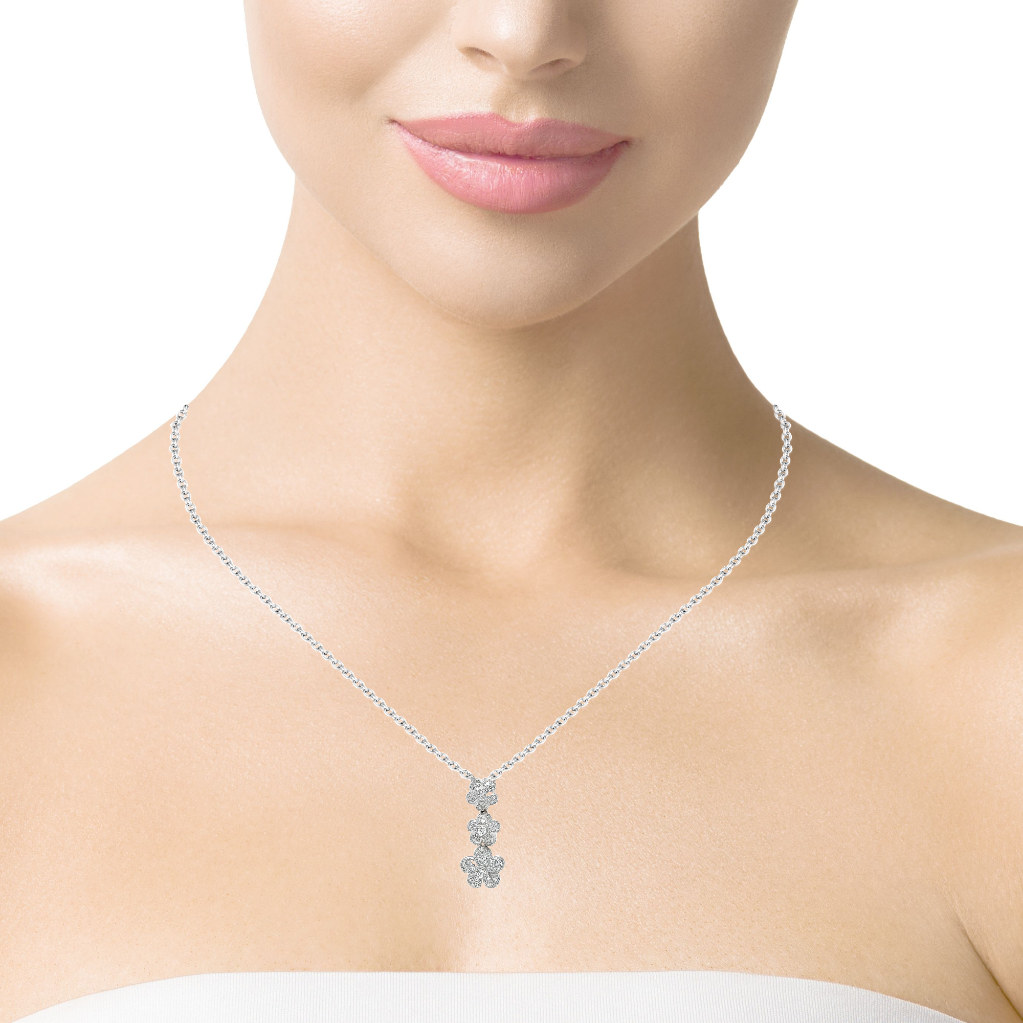 Indulge in luxury with our Three Diamond Drop Flower White Gold Necklace. Adorn yourself with elegance and sophistication with this 14 kt white gold necklace featuring three exquisite diamond flowers totaling 1.50 tw. Upgrade your style with this one-of-a-kind piece.