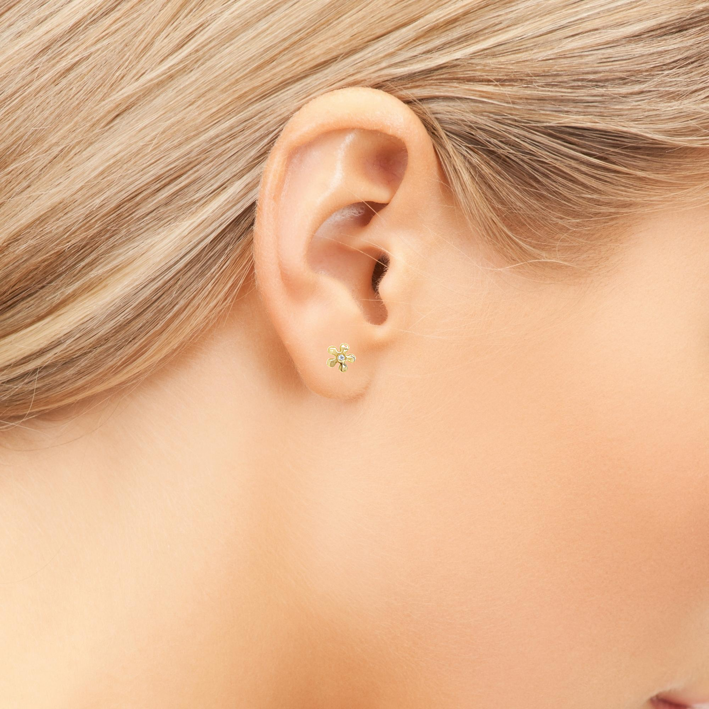 Try on view of 18k Yellow Gold Baby Yellow Gold Diamond Flower Earrings