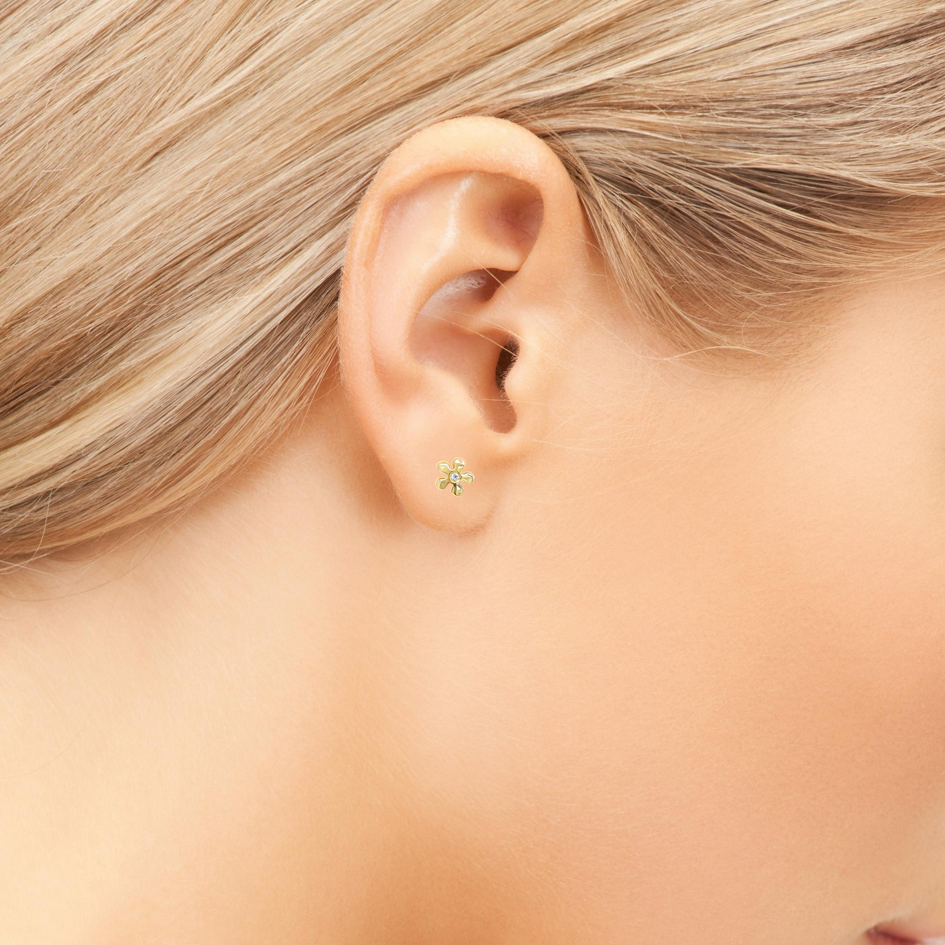 Try on view of 18k Yellow Gold Baby Yellow Gold Diamond Flower Earrings