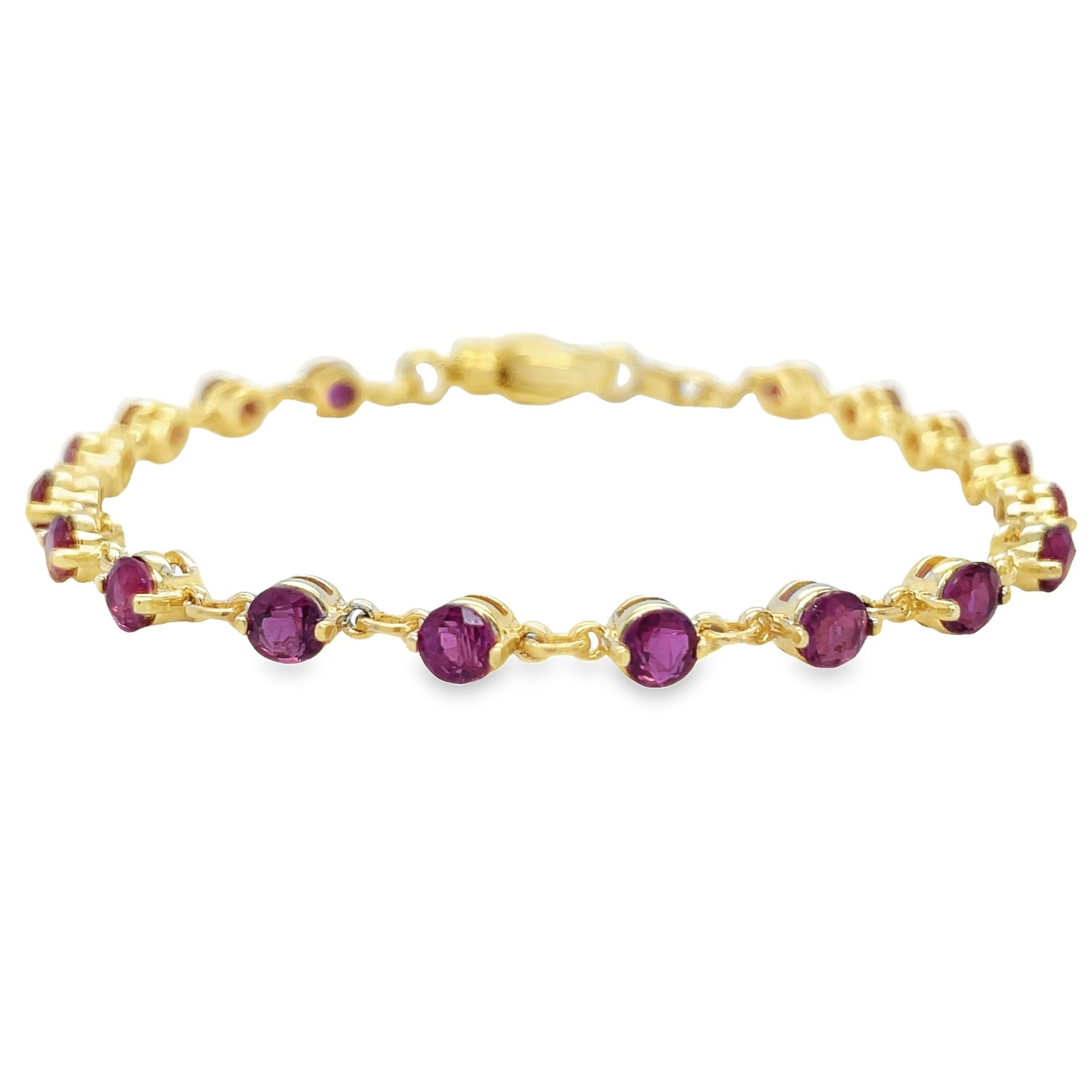 This Ruby Yellow Gold Bracelet features a sparkling round ruby weighing 3.60 carats. The 14k yellow gold setting is both elegant and durable, while the secure lobster catch ensures this bracelet stays comfortably on your wrist at 7" long. Enhance your look with this stunning piece.