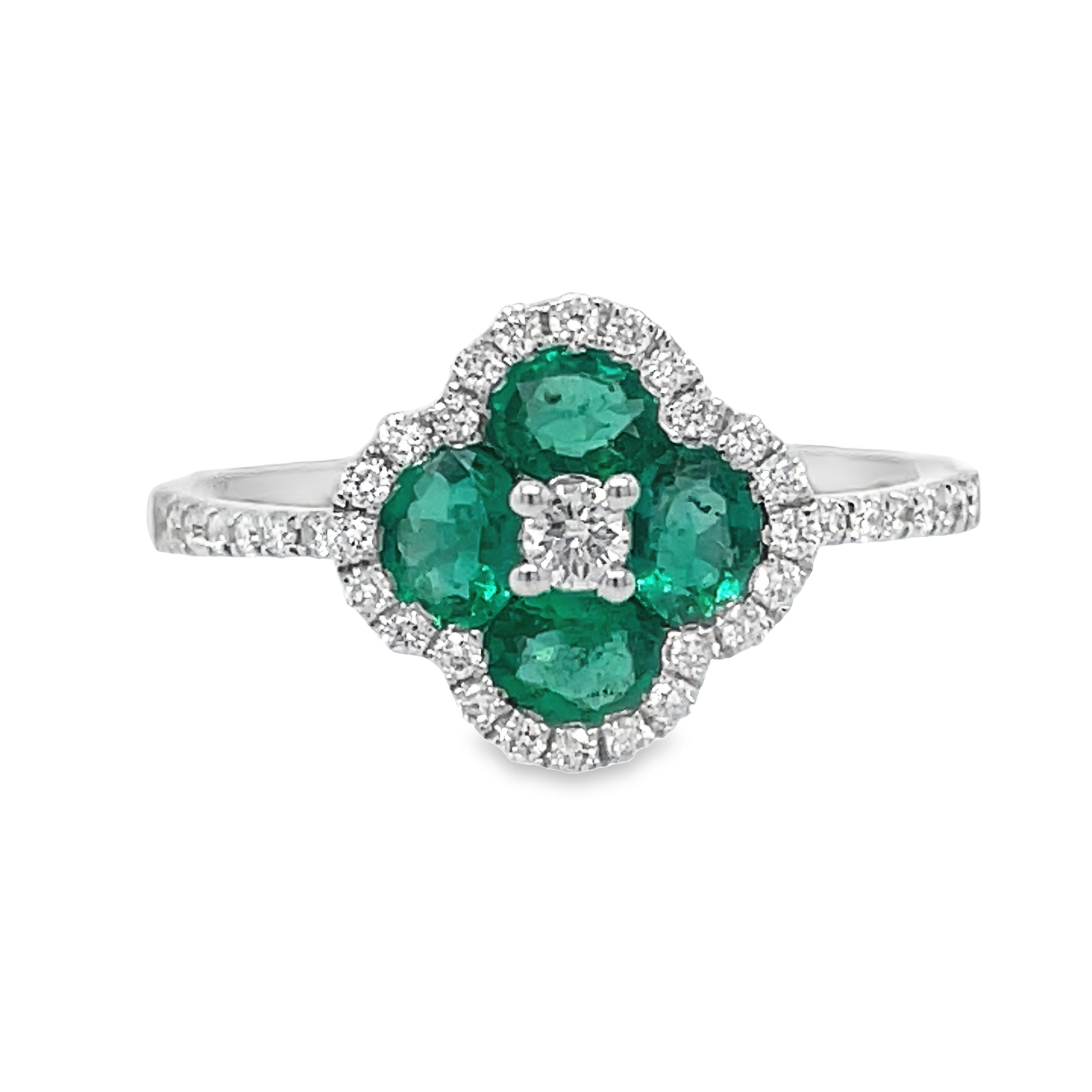 This elegant ring features a stunning floral design with a 14k yellow gold band, surrounded by sparkling white round diamonds totaling 0.25 carats. The centerpiece includes four round emeralds, totaling 0.70 carats and measuring 11mm in diameter. Add a touch of sophistication and luxury to any outfit with this beautiful piece.