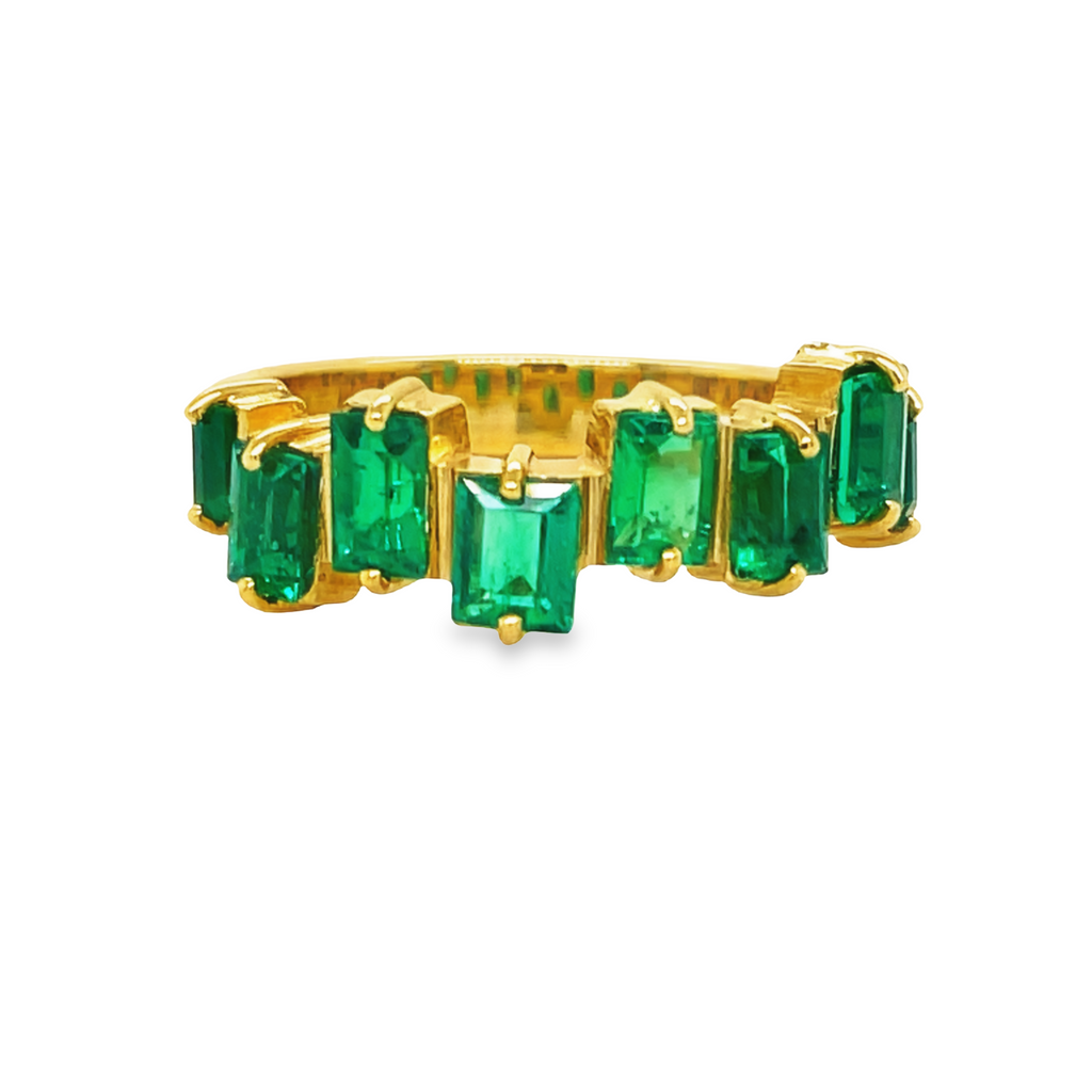 This Colombian Emerald Baguette Zig Zag Ring is a unique piece of jewelry craftsmanship, custom-made to commemorate the 40th anniversary of our company logo. Featuring 2.00 cts of high-quality emeralds mined from Colombia's Muzo Mines, this ring is a luxurious and eye-catching statement piece.