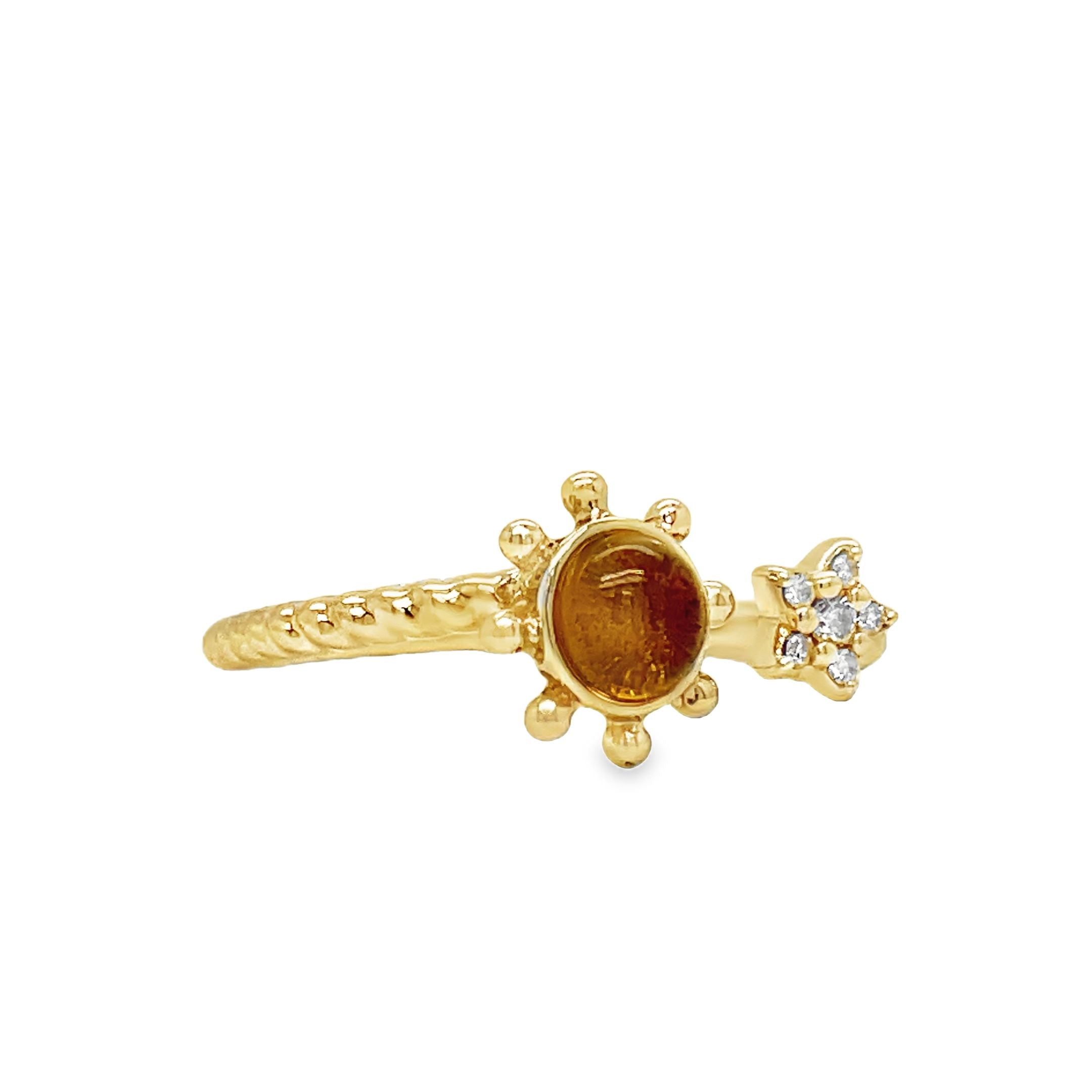 Indulge in luxury with our Yellow Gold Citrine Sun and Diamond Star Open Ring. Crafted with 14k yellow gold, a stunning citrine cabochon, and sparkling round diamonds, this open ring exudes elegance and sophistication. Perfect for adding a touch of glamour to any outfit.