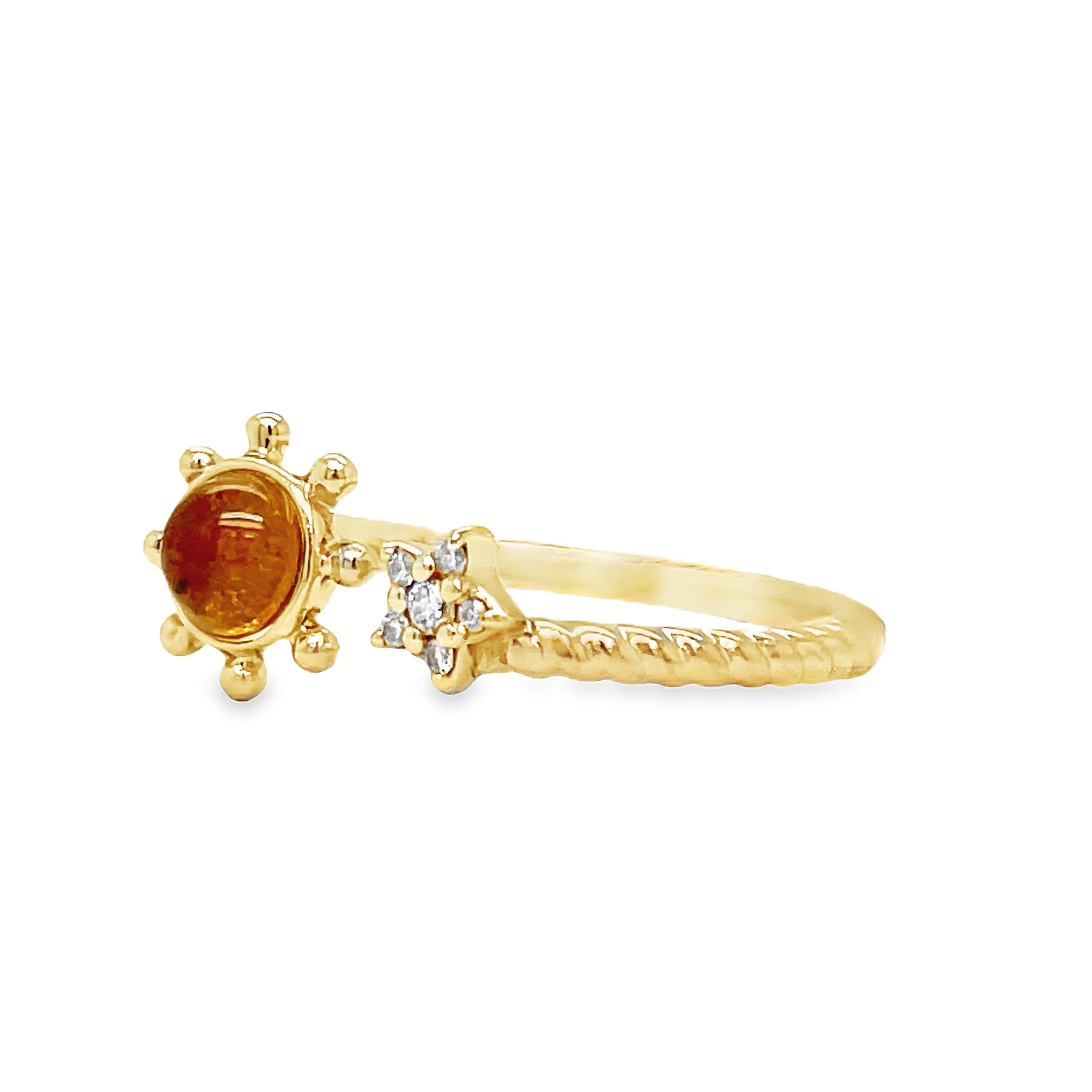 Indulge in luxury with our Yellow Gold Citrine Sun and Diamond Star Open Ring. Crafted with 14k yellow gold, a stunning citrine cabochon, and sparkling round diamonds, this open ring exudes elegance and sophistication. Perfect for adding a touch of glamour to any outfit.