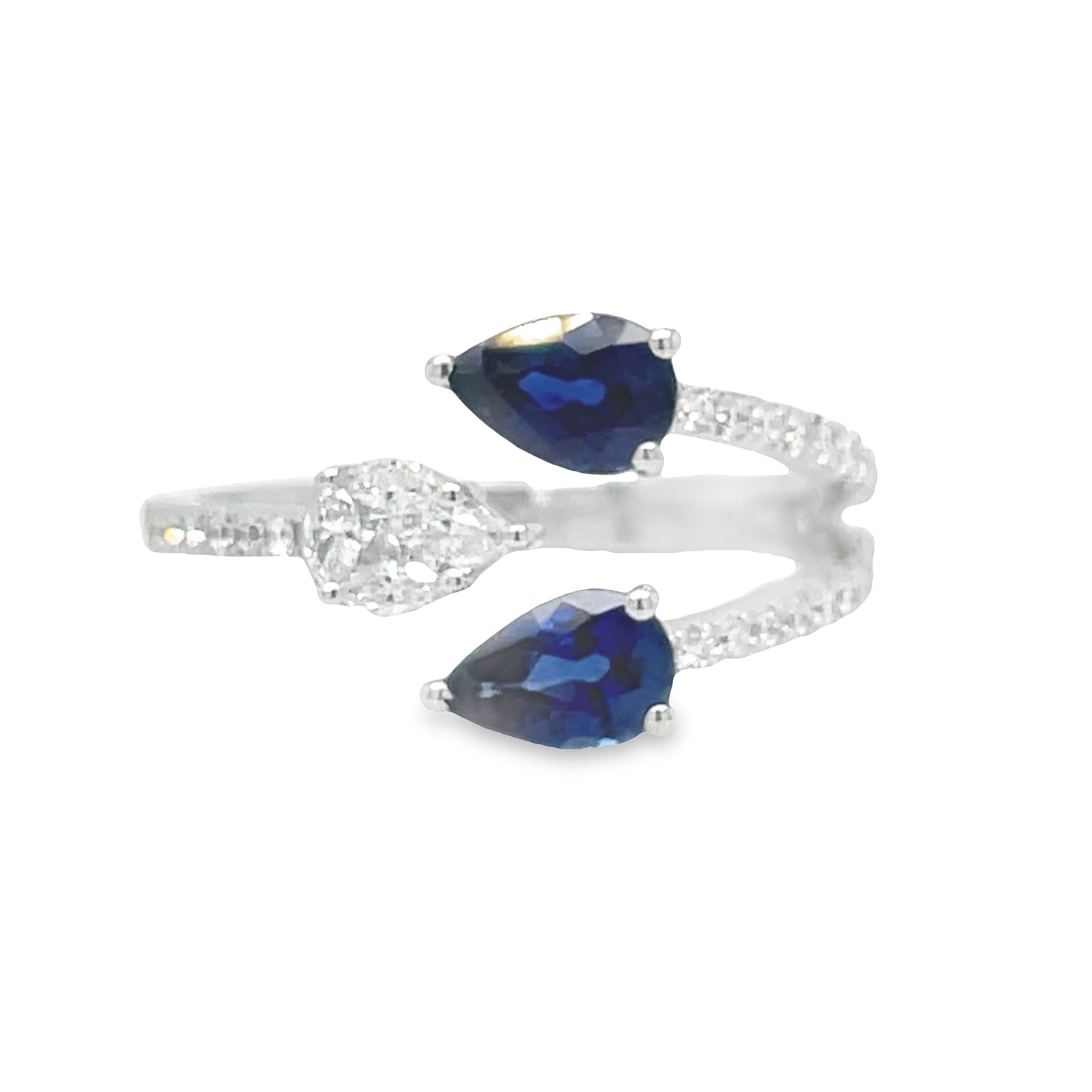 This elegant Pear Shape Sapphire & Pear Shape Open Diamond Ring is the perfect accessory for any special occasion. Crafted with two pear sapphires 1.11 cts and one diamond pear shape 0.34 cts set in 18k white gold, this exquisite open ring will make an unforgettable statement. Make your mark with this stunning piece!