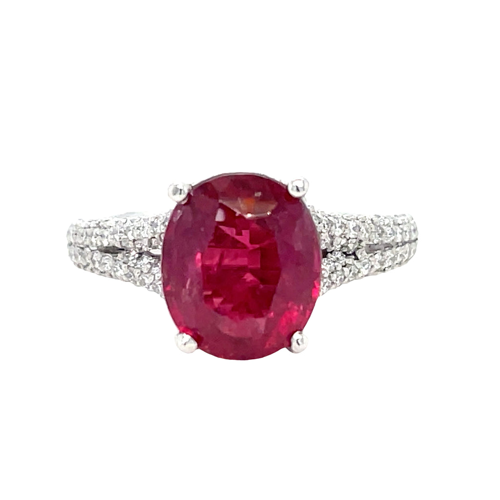 Adorn your hand with sophisticated glamour with our Oval Burmese Ruby and Diamond Ring. Crafted in platinum, the eye-catching centerpiece is a Burmese oval ruby of 2.58 carats, beautifully framed by 1.20 carats of dazzling round diamonds. Experience timeless elegance with this exquisite piece.