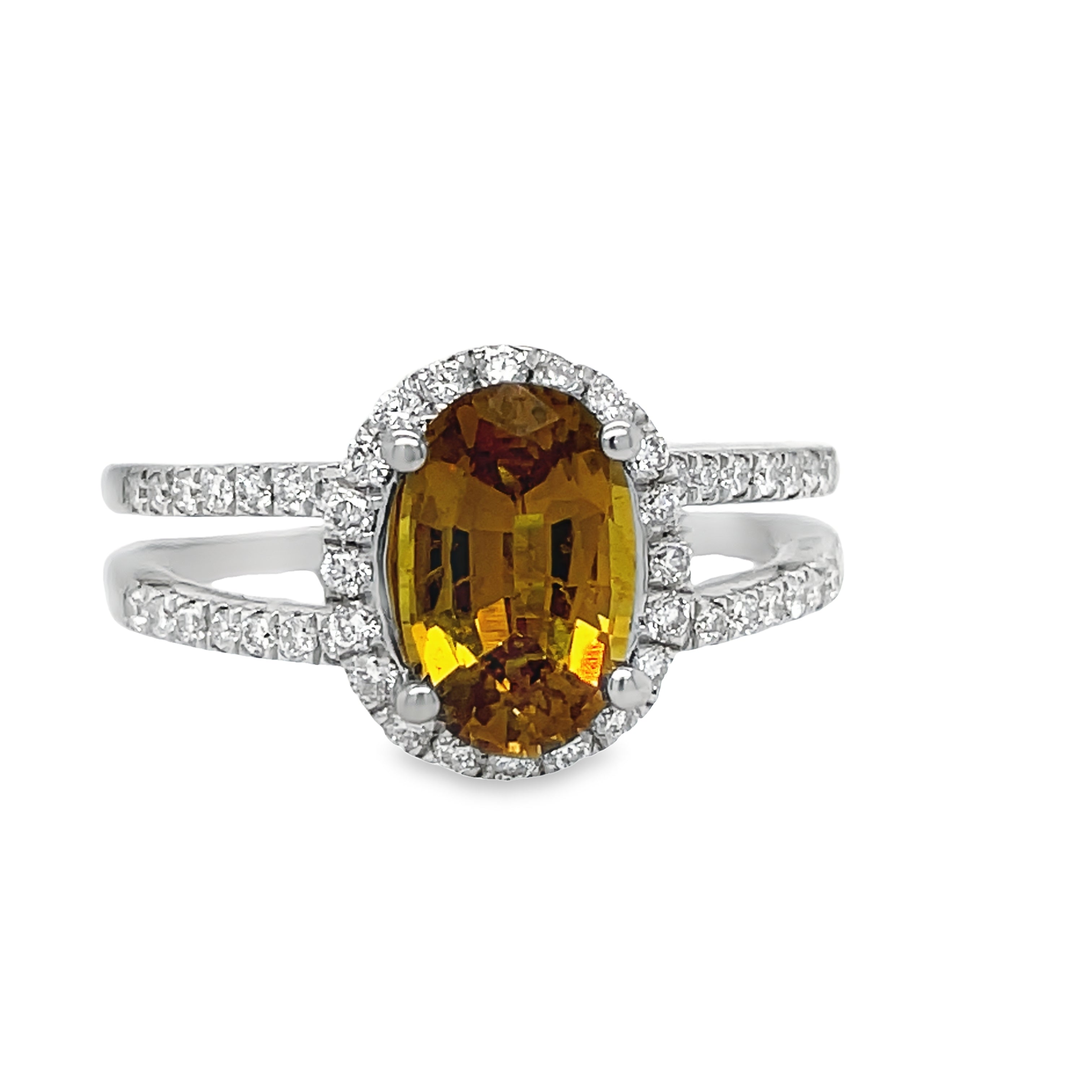 &nbsp;Expertly crafted from platinum, this stunning ring features a 0.37 ct double row of sparkling round diamonds and a beautiful oval brownish yellow sapphire. Elevate any look with this luxurious and unique piece, perfect for any occasion.