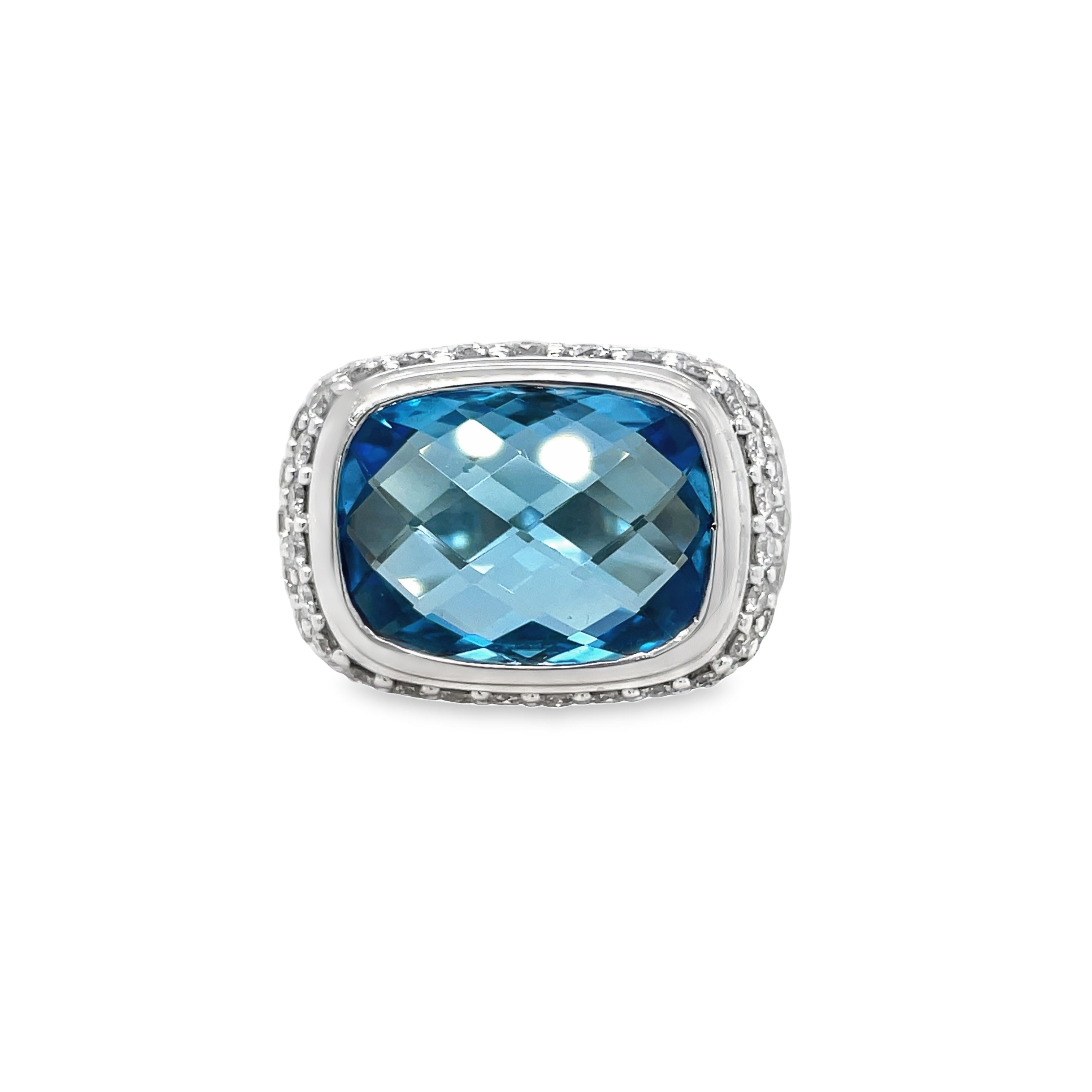 Elevate your style with our luxurious Sterling Silver Yurman Diamond Blue Topaz Chunky Ring. Made with genuine sterling silver and adorned with sparkling round diamonds and a stunning blue topaz gemstone, this chunky ring exudes elegance and sophistication. Perfect for any occasion, it's sure to make a statement and turn heads wherever you go.