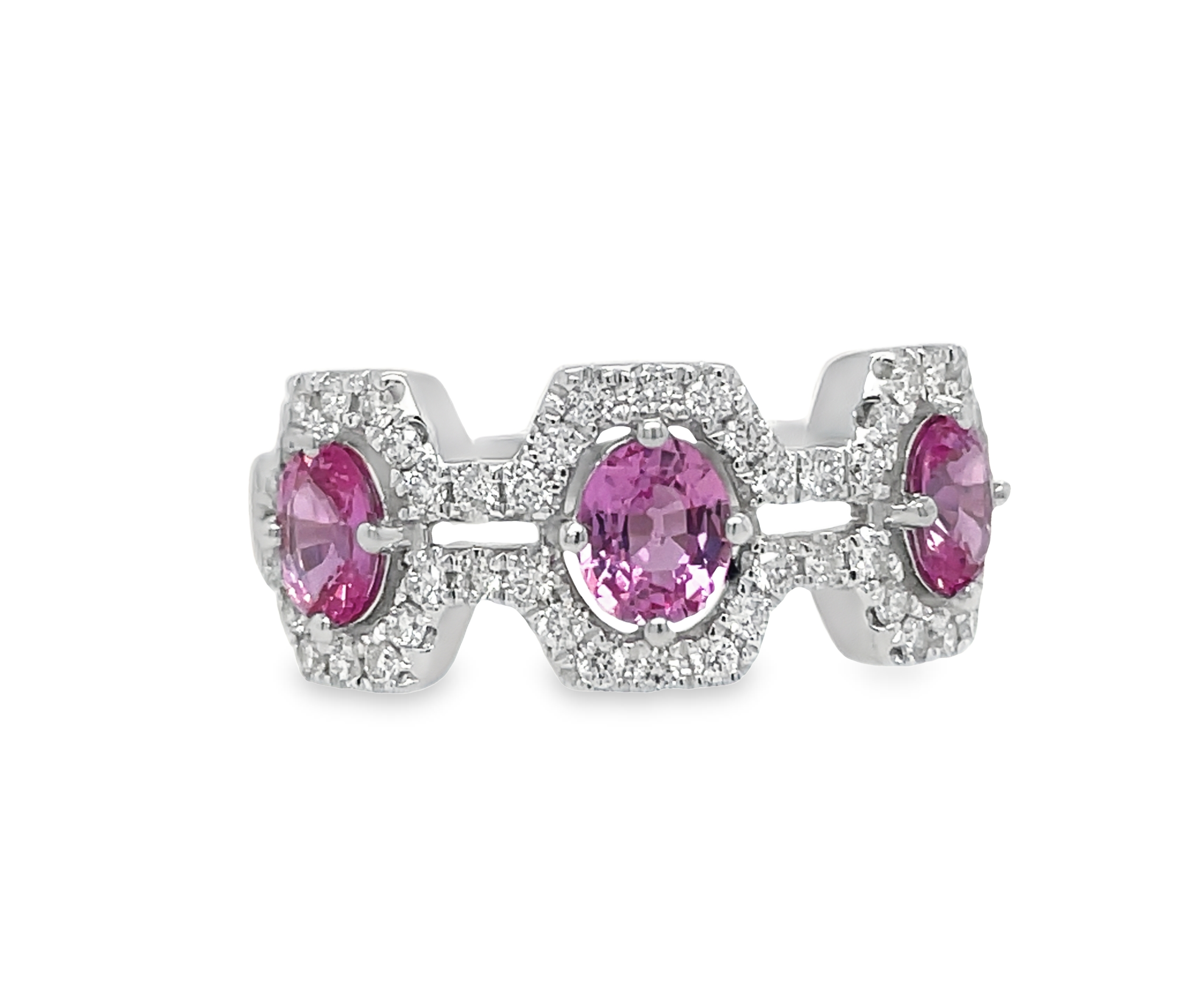 This 18k white gold ring features five stunning oval pink sapphires, totaling 1.18 carats, and sparkling round diamonds with a total weight of 0.47 carats. The perfect combination of elegance and femininity, this ring is sure to make a statement.