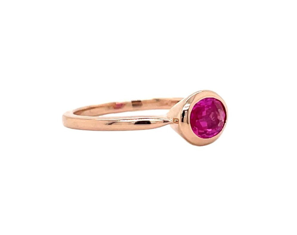 Side view of 14k Rose Gold Pink Ceylon Oval Sapphire Ring 1.03 cts