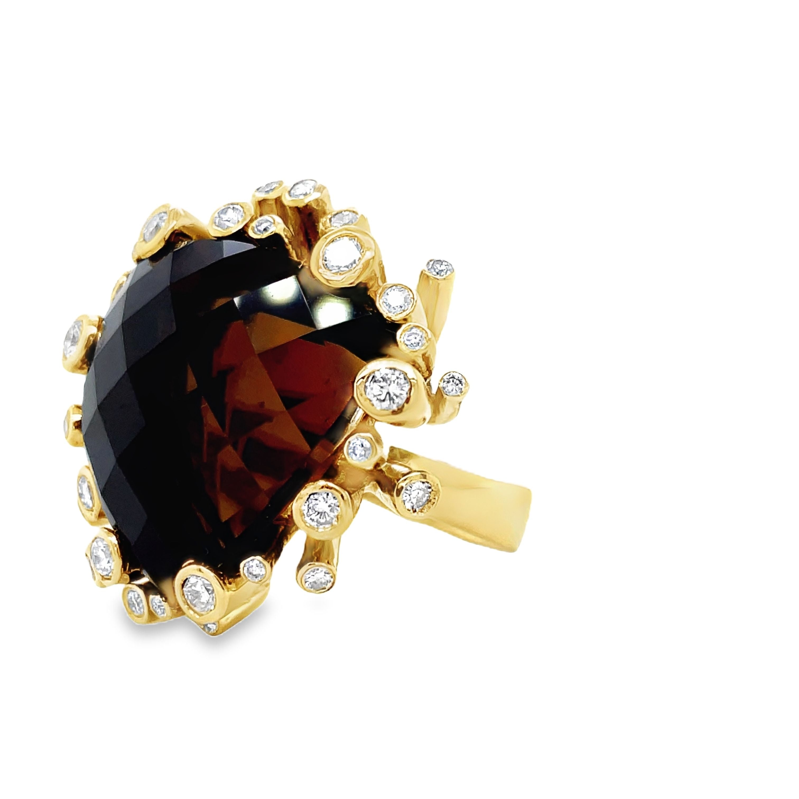 Indulge in luxury with our Smoky Topaz &amp; Diamond Cocktail Ring. Crafted from 18k yellow gold, the trillion-shaped smoky topaz catches the light, while 1.00 cts of round diamonds add sparkle. A sophisticated statement piece, perfect for any elegant occasion.