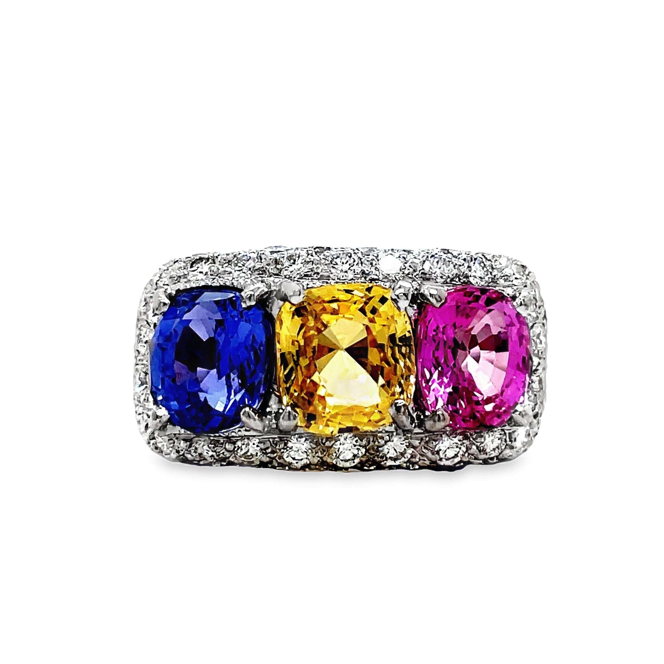 Introducing our Tricolor Sapphire Ring, a true masterpiece. The 4.50 cts of oval shaped pink, yellow, and blue sapphires create a captivating combination, set in 18k white gold. Adorned with 1.50 cts of pave set diamonds, this ring exudes luxury and elegance. Elevate your style with this exclusive piece.