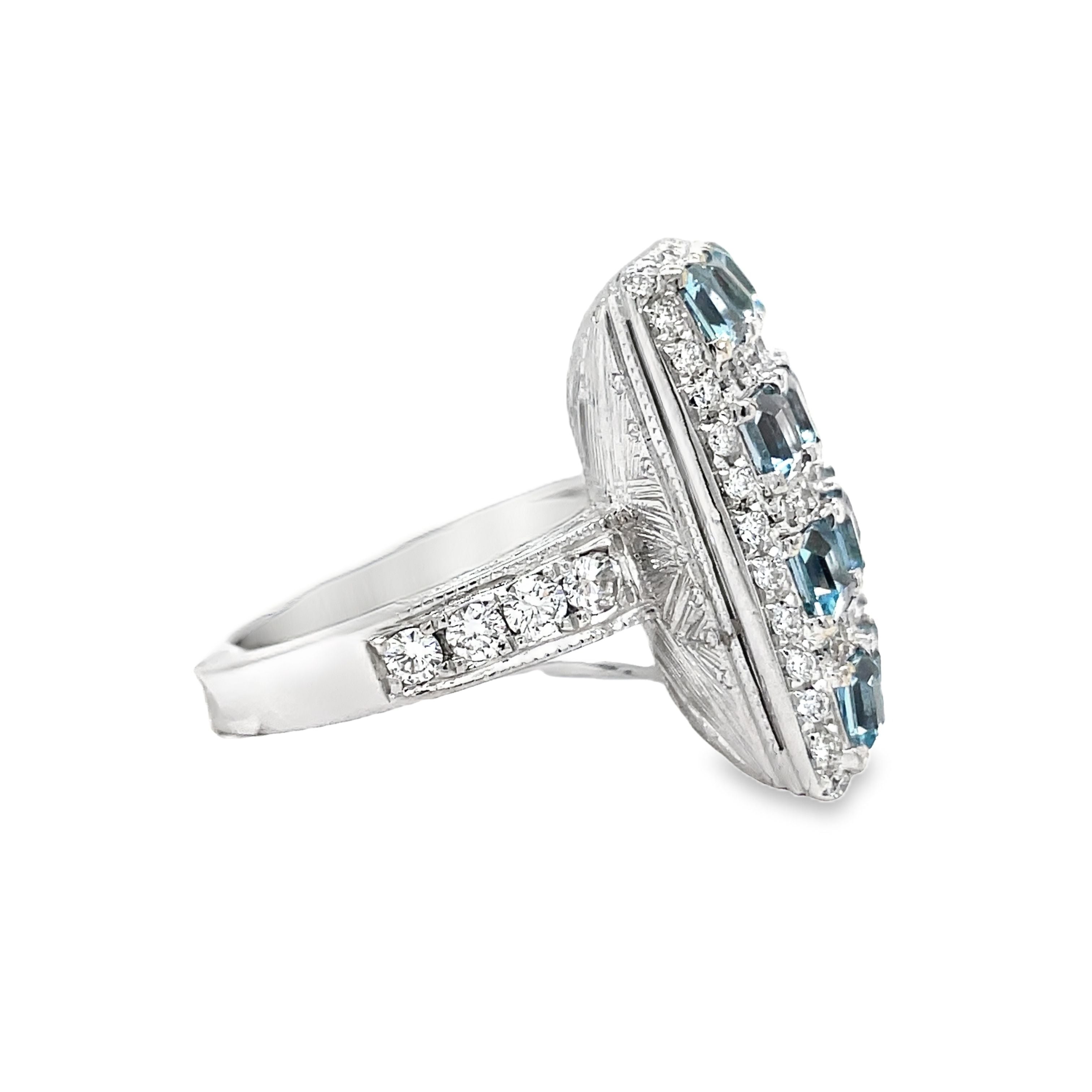 Introducing our Italian-made Aquamarine and Diamond Fashion Ring. Hand-engraved with a square design, this ring radiates luxury and sophistication. Crafted with 18k white gold, a 2.20 carat cushion-cut aquamarine and 1.49 carats of sparkling round diamonds, this piece is a masterpiece of elegance. Elevate your style with this exclusive and timeless ring.