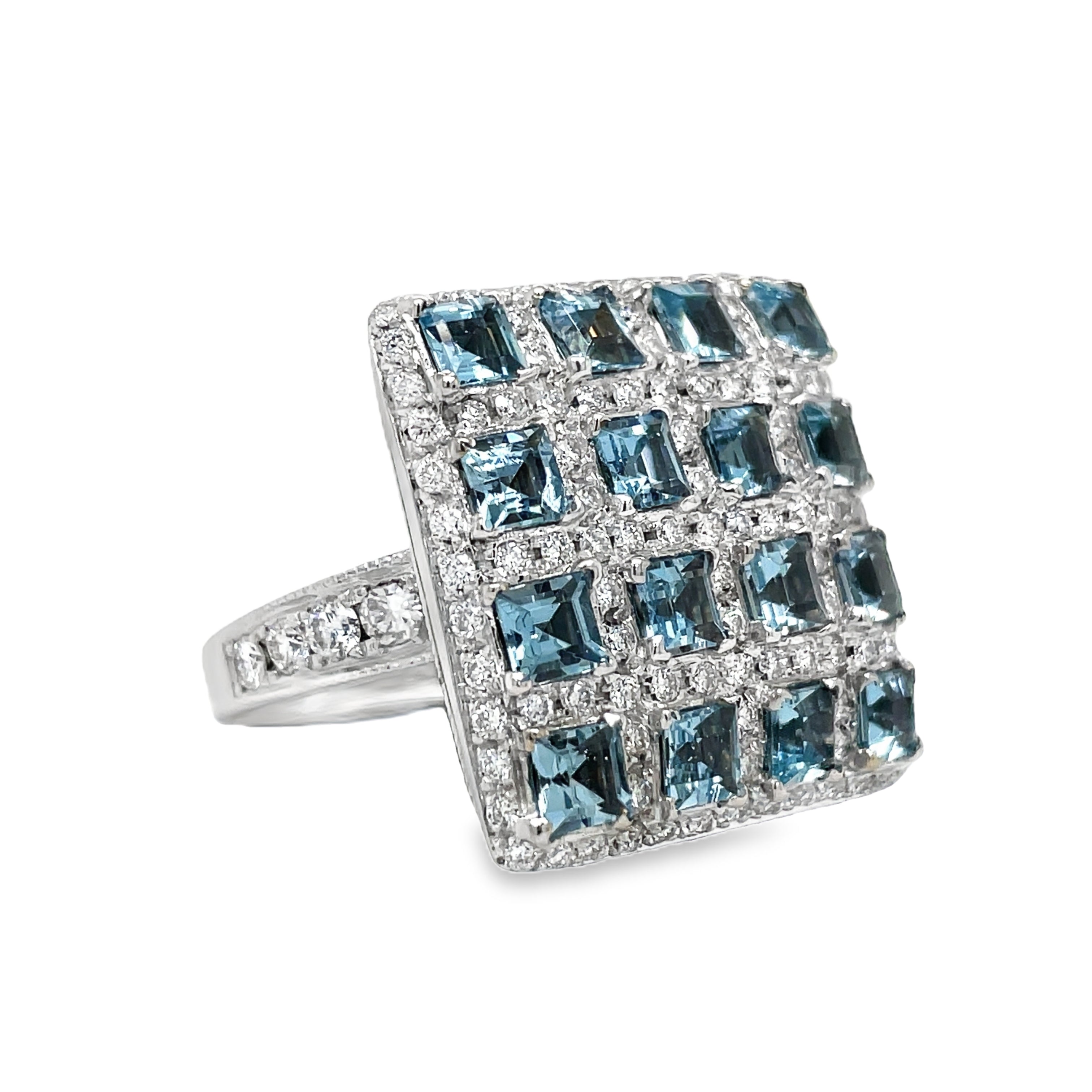 Introducing our Italian-made Aquamarine and Diamond Fashion Ring. Hand-engraved with a square design, this ring radiates luxury and sophistication. Crafted with 18k white gold, a 2.20 carat cushion-cut aquamarine and 1.49 carats of sparkling round diamonds, this piece is a masterpiece of elegance. Elevate your style with this exclusive and timeless ring.