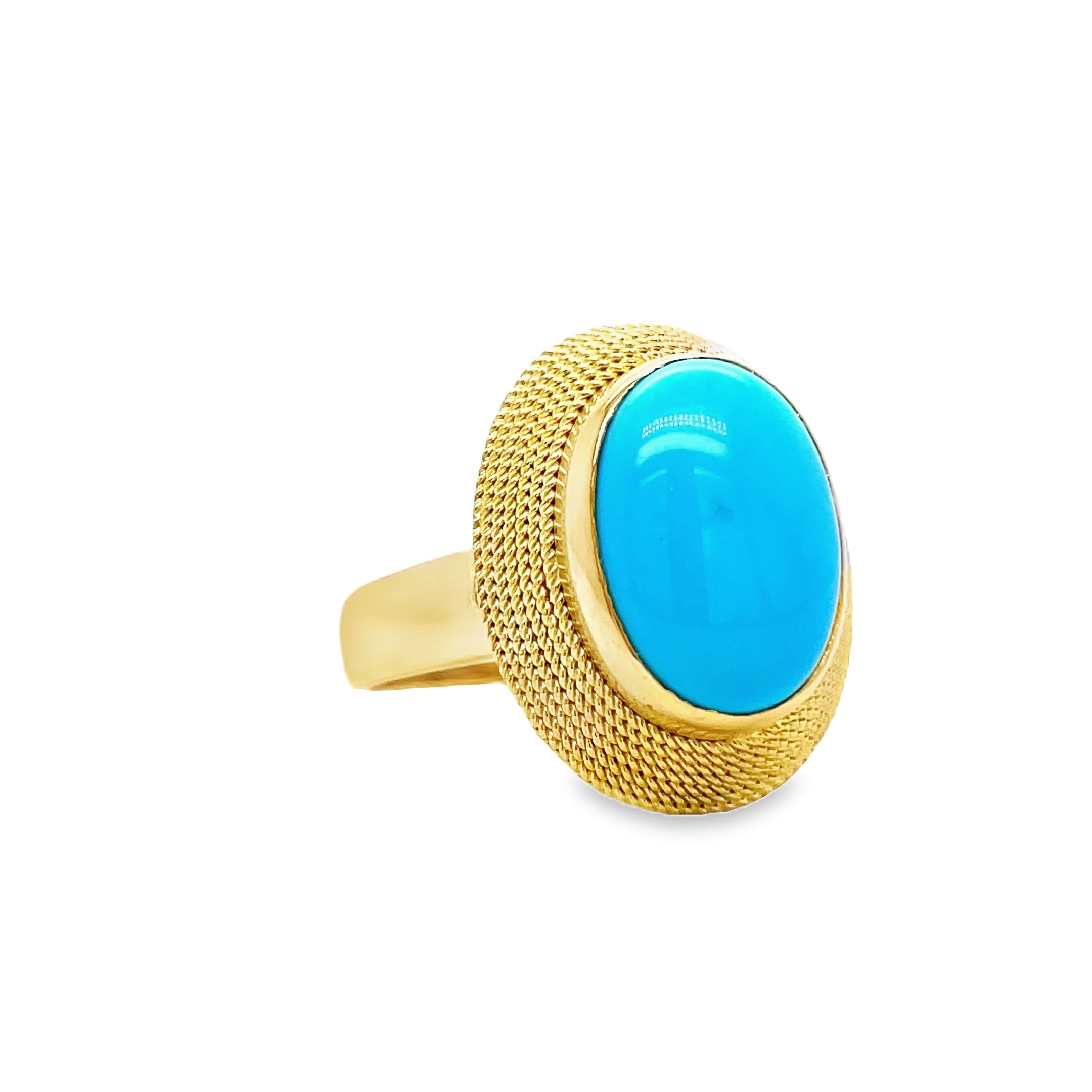 Indulge in the allure of our 18k Italian Made Turquoise Cabochon Ring. Handcrafted with a matte finish and ornate rope detailing, this ring exudes luxury. Adorned with a captivating turquoise cabochon and gallery finish at the back, it's the perfect marriage of elegance and art.