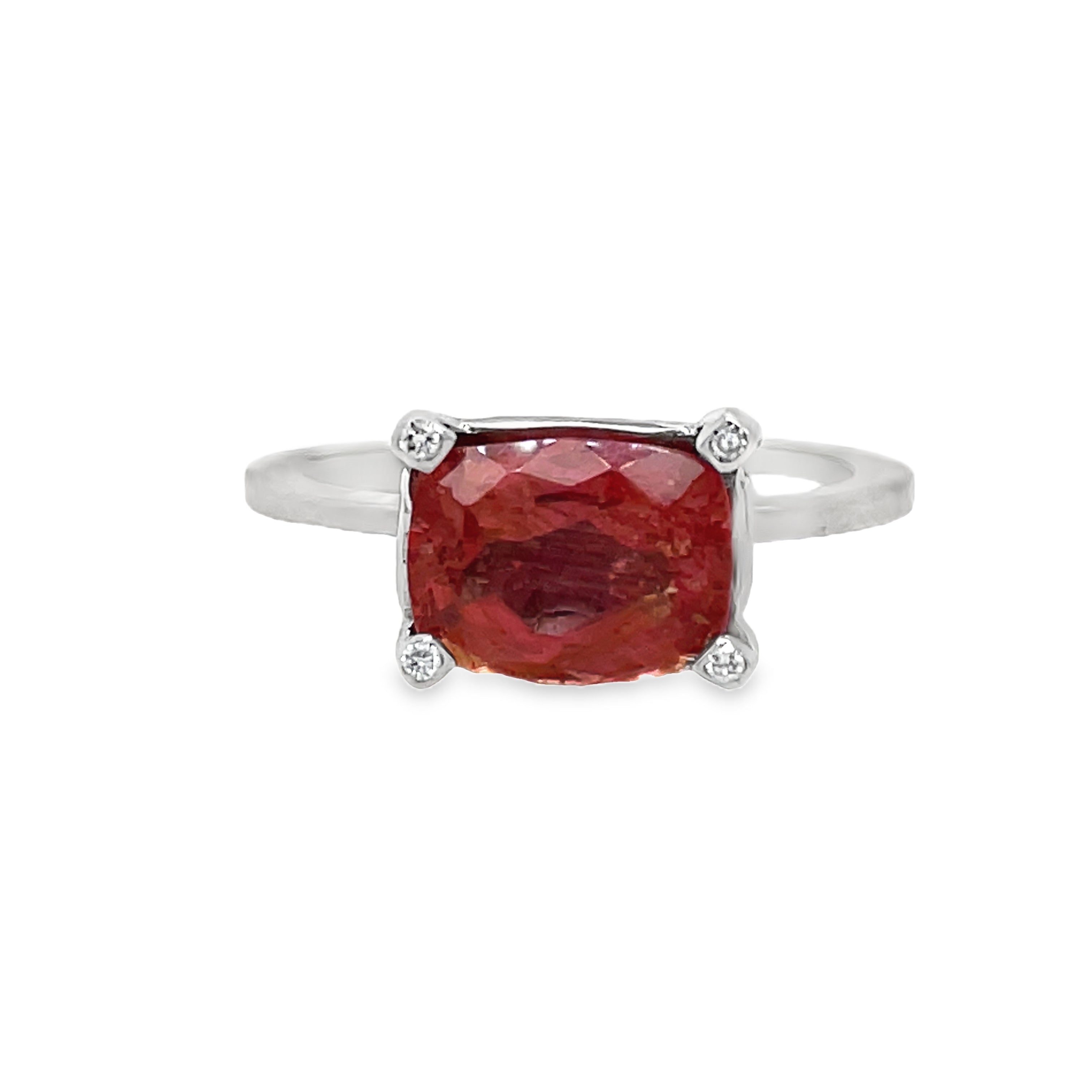 Indulge in luxury with our Horizontal Oval Cut Pink Topaz Ring. Crafted with 14k white gold, this ring features a stunning oval cut pink tourmaline, accented by four small diamonds on each corner. The horizontal setting adds a unique touch of elegance to this timeless piece. Elevate your style with this exclusive ring.