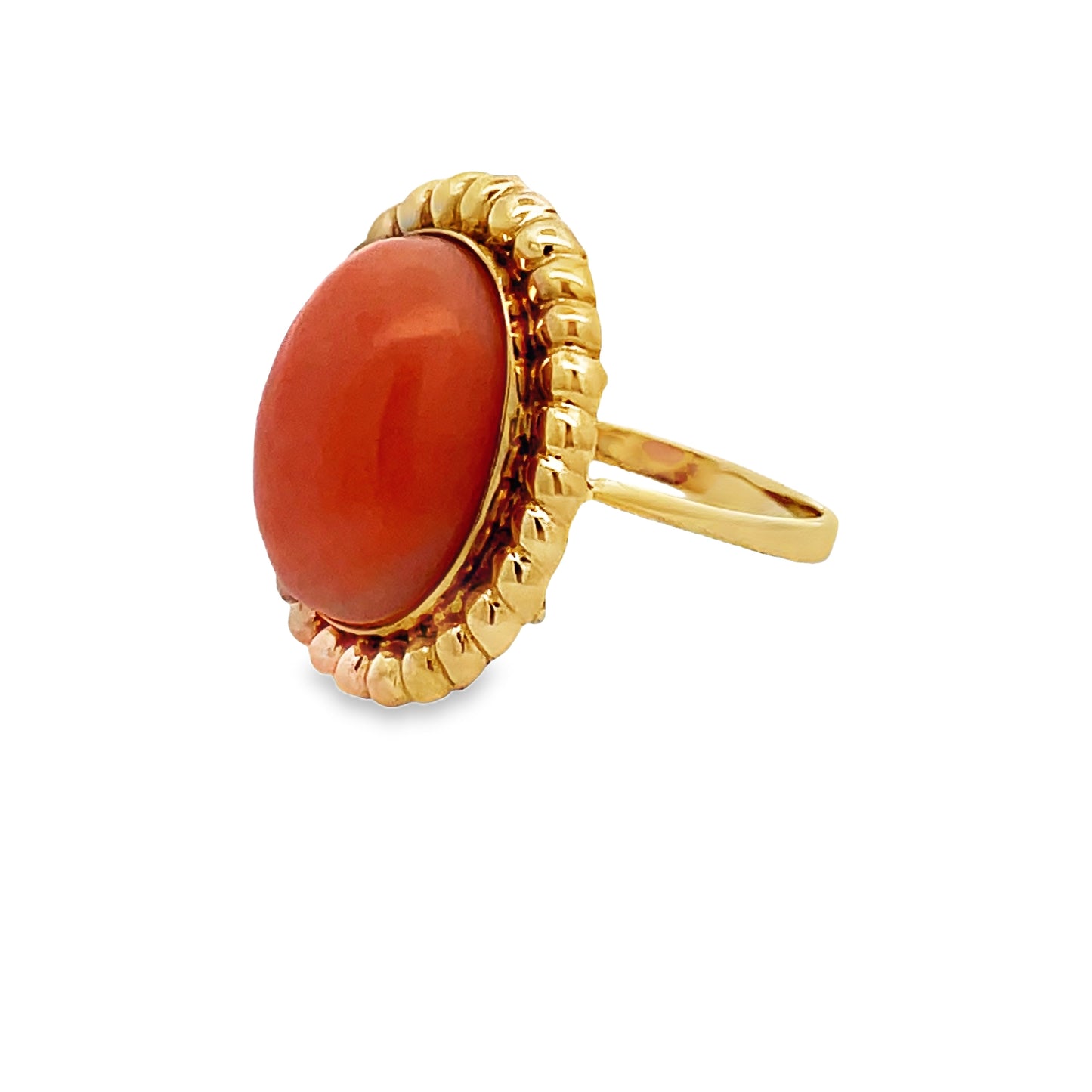 Side view of 14k Yellow Gold Oval Shape Coral Ring 