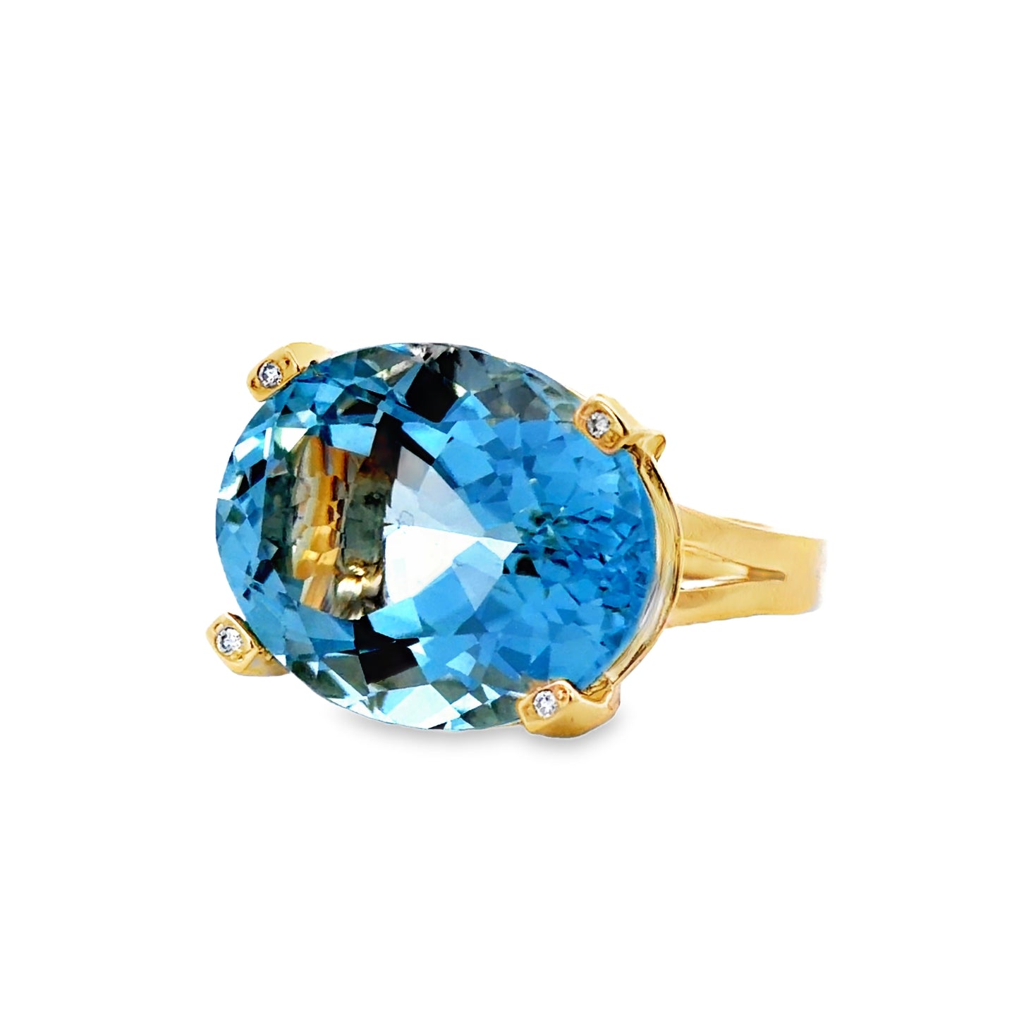 Side view of Oval Aquamarine Solitaire & Diamond Ring in Yellow Gold