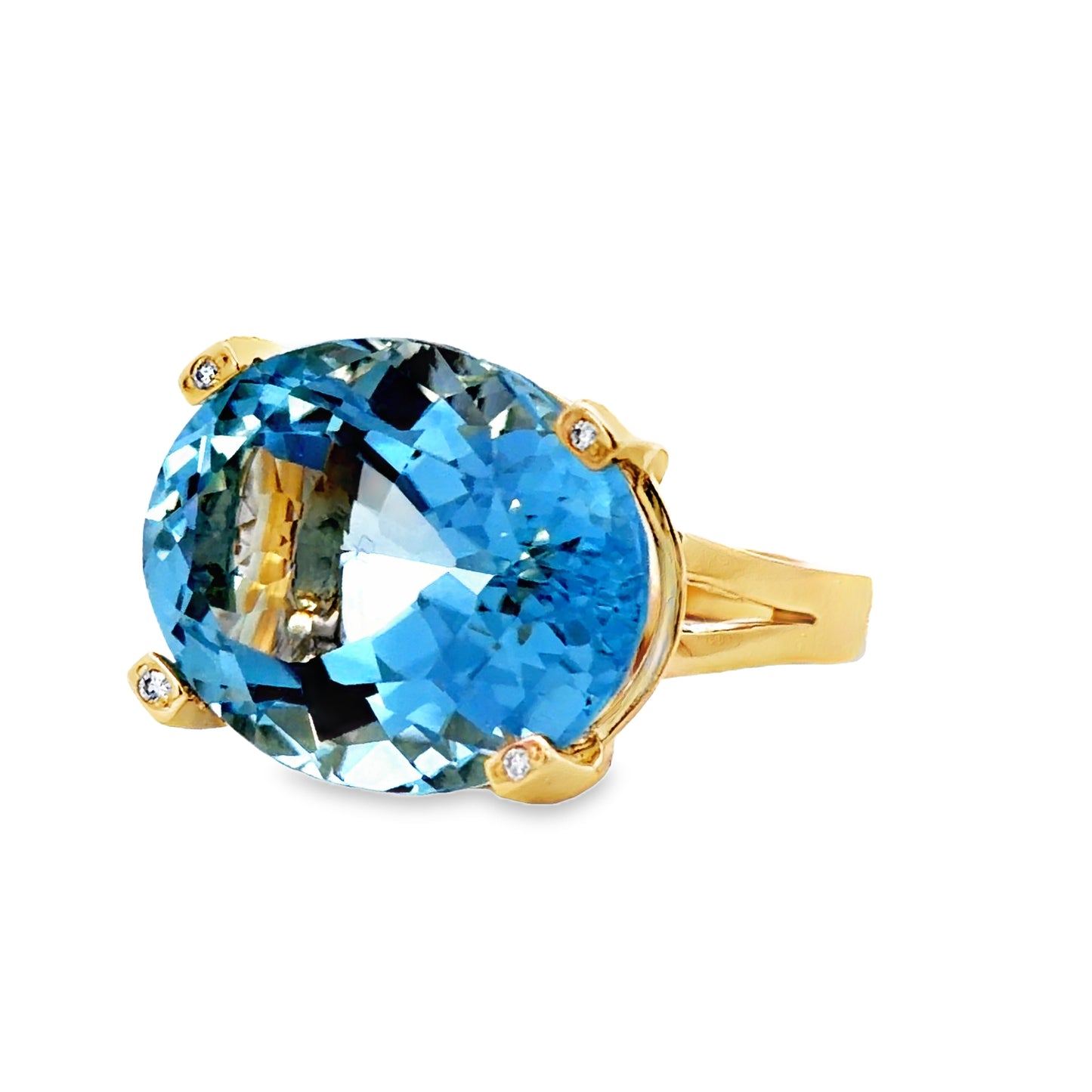 Side view of Oval Aquamarine Solitaire & Diamond Ring in Yellow Gold