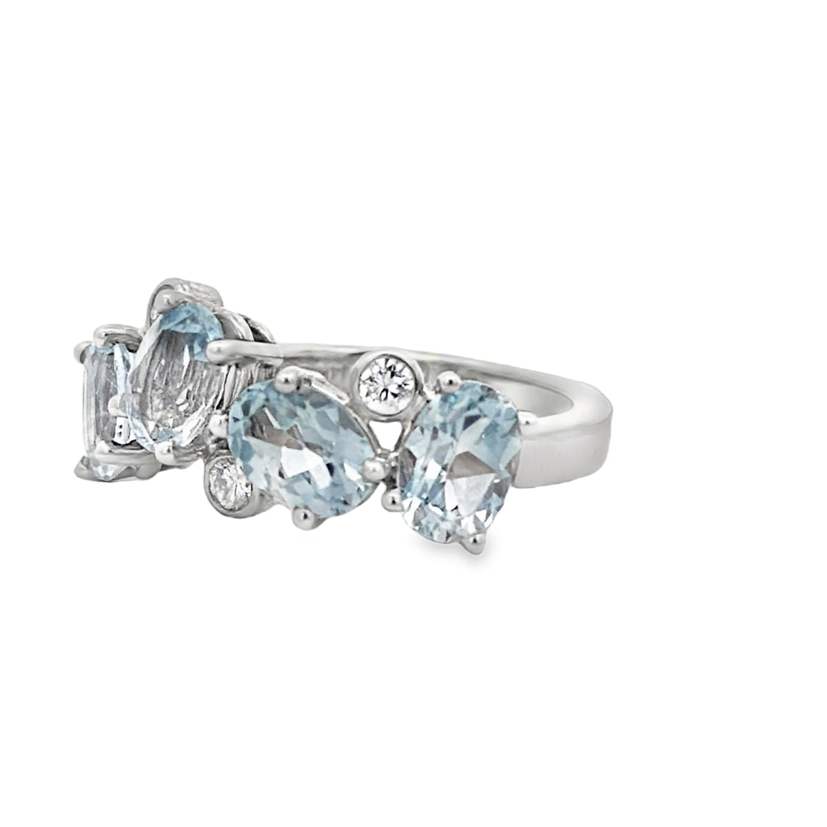 Side view of 14k White Gold Oval Aquamarine & Diamond Cluster Ring