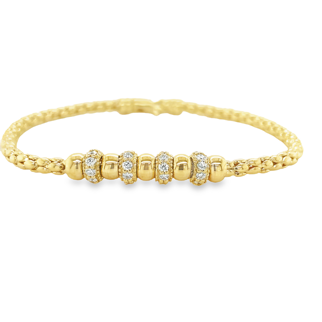 Treat yourself to this gorgeous 14 kt yellow gold Bead & Diamond Bracelet. Eye-catching 4 gold rondelles and 4 diamond rondelles (0.63 cts) make up the dazzling design. With the lobster and popcorn link closure, you can be sure to enjoy a sophisticated and secure piece!