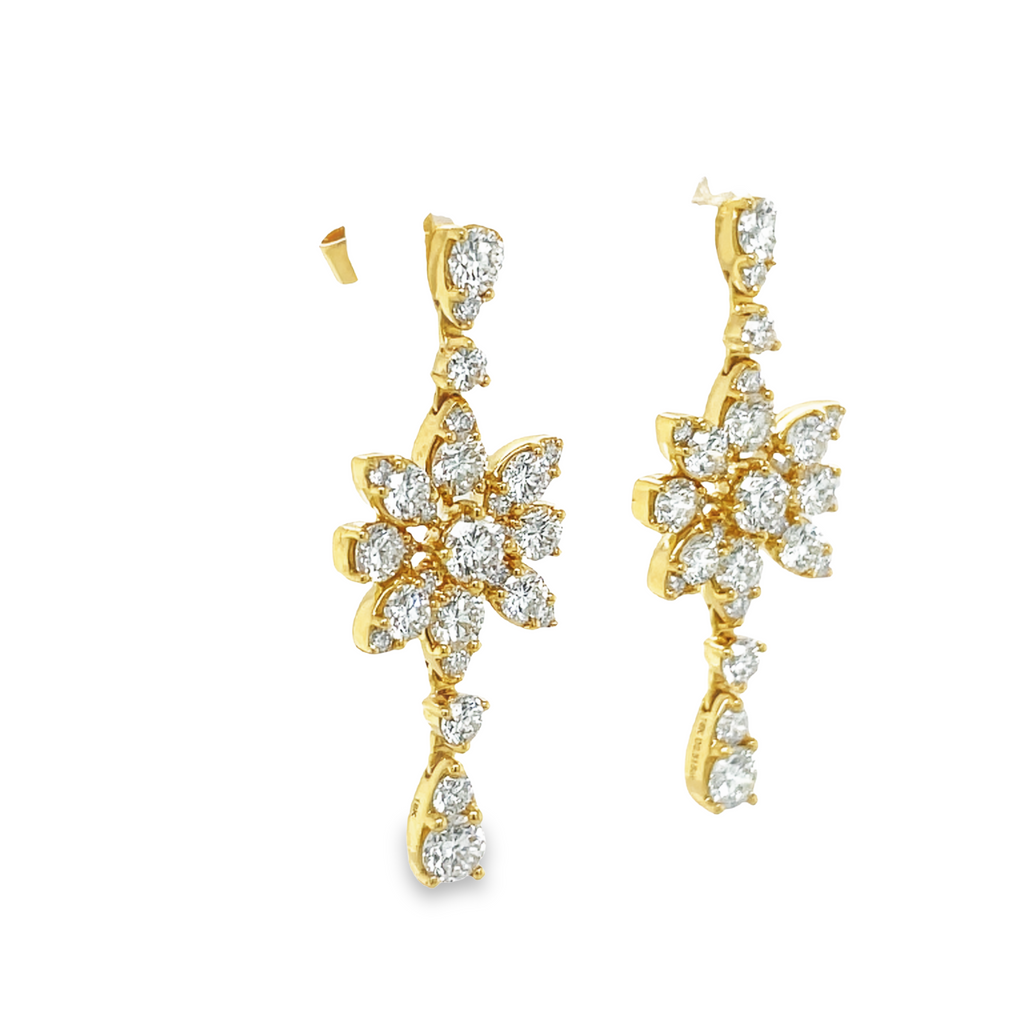 <p>Stunning diamond earrings.&nbsp;</p> <p>14k two tone white &amp; rose gold</p> <p>Secure hinge closure&nbsp;</p> <p>Round diamonds 0.52 cts</p> <p>2" long x 10.00 mm&nbsp;</p> <p>Two diamond flowers &amp; two white enamel flowers</p>
