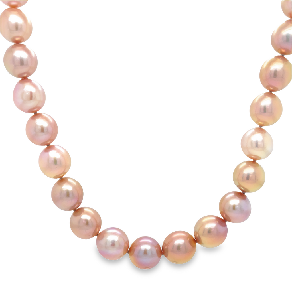 This Edison Cultured Pearl Necklace is crafted with freshwater pearls that take 2-3 years to grow. It features 12.00mm pearls, which are twice as large as regular freshwater pearls, and boast unique colors ranging from pink to violet. It's an exquisite statement piece that will elevate any look.