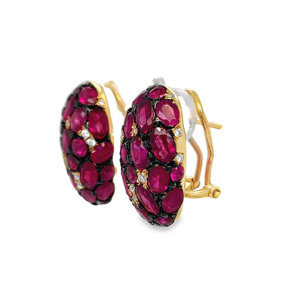 Indulge in luxury with our Ruby & Diamond Large Earrings! The oval shape rubies, 1.40 cts, are set in 18k rose gold and accented with black rhodium. Each earring also features 0.20 cts of sparkling round diamonds and a secure omega clip system. Elevate your style with these stunning and sophisticated earrings!