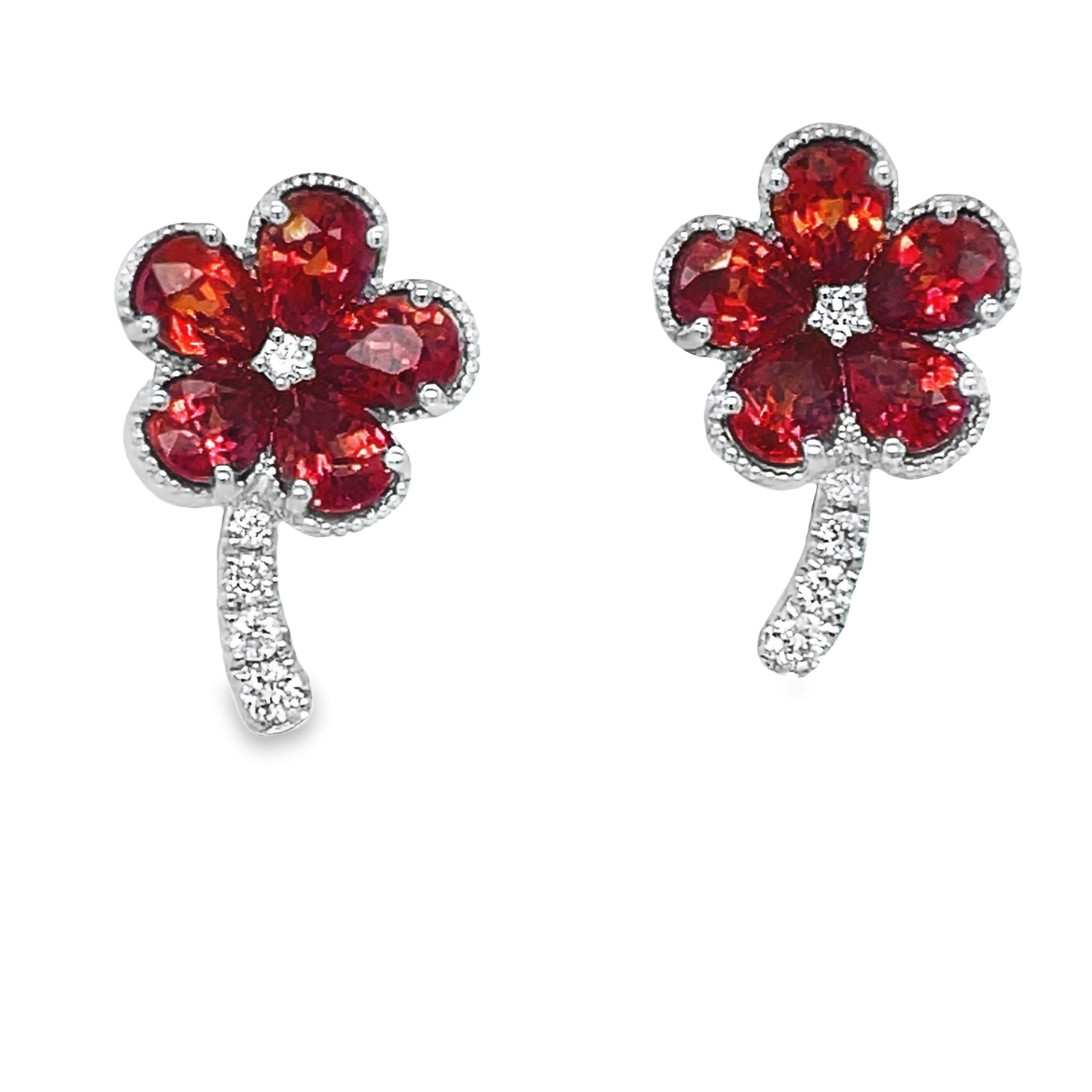 Expertly crafted with 18k white gold, these Orange Sapphire &amp; Diamond Flower Earrings feature intense orange sapphires totaling 2.19 carats and round diamonds totaling 0.11 carats. The secure friction backs ensure comfortable and worry-free wear. Elevate your look with the vibrant color and sparkling beauty of these stunning earrings.