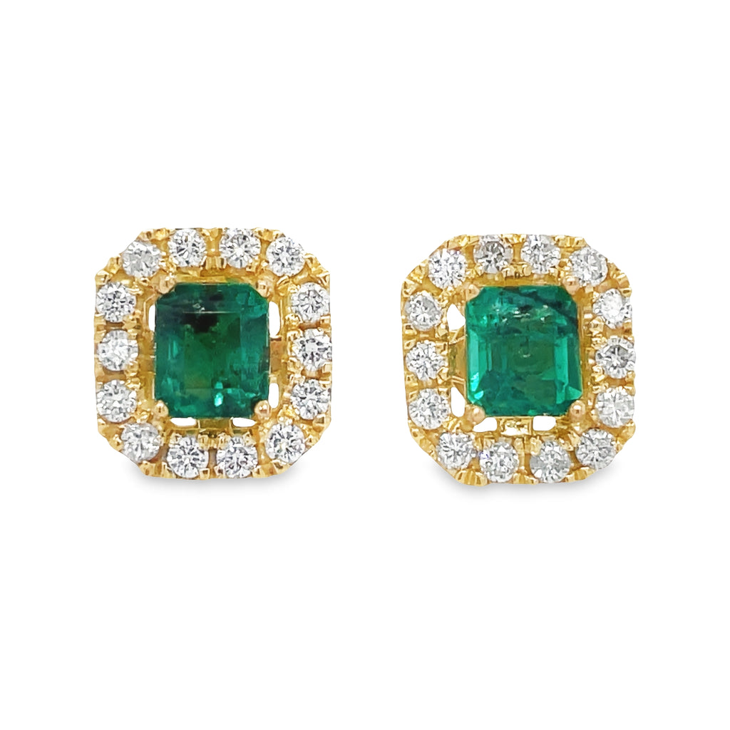 These Colombian emerald stud earrings are expertly crafted with 1.80 cts of emeralds with a 0.40 cts diamond halo set in 18k yellow gold. The emeralds are of very good color and clarity, making them a stunning addition to any jewelry collection.