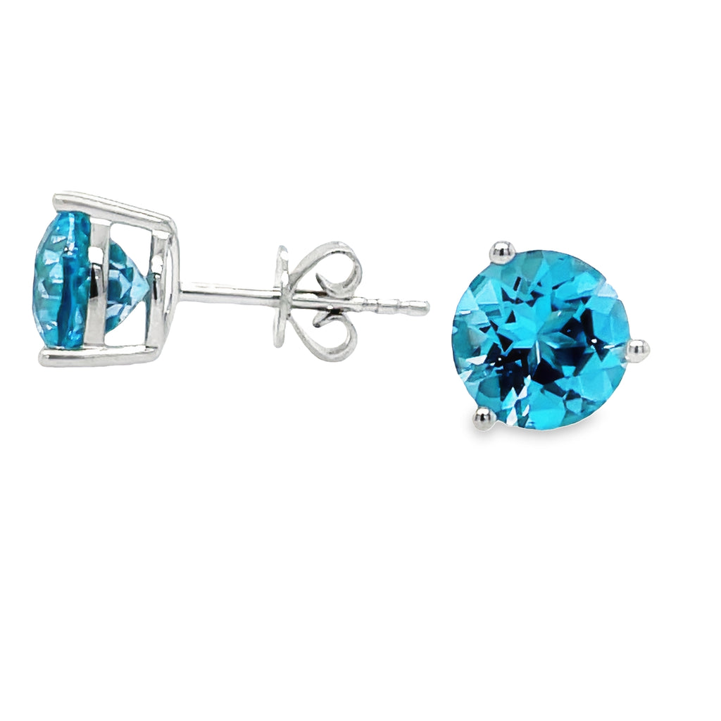 Beautifully crafted in 14k white gold, these citrine stud earrings will add a luxurious sparkle to any outfit. The large round blue topaz are secured with friction backs, ensuring a secure fit that will make you feel confident. Make a bold and sophisticated statement with these stunning earrings!