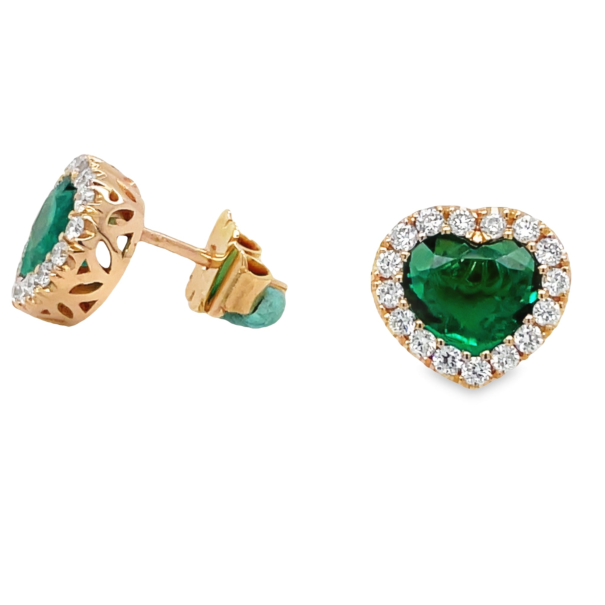 These Colombian Emerald and Diamond Stud Earrings feature a 2.00 cts heart shape cut emerald in 18k rose gold, complimented by round diamonds. This elegant earring set is perfect for those looking to add the perfect combination of sparkle and sophistication to their look.
