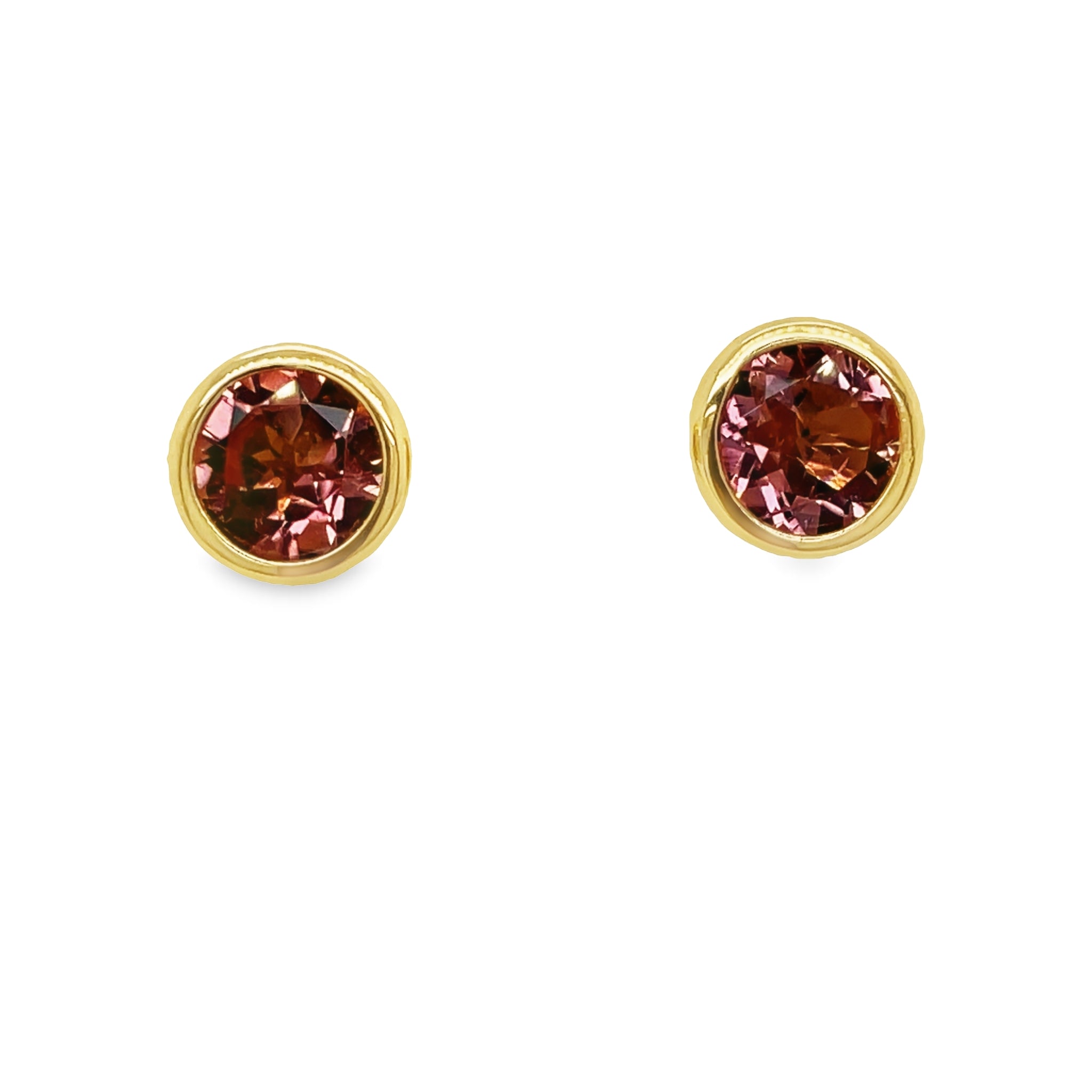 Beautifully crafted in 18k yellow gold, these citrine stud earrings will add a luxurious sparkle to any outfit. The large round pink tourmaline are secured with friction backs, ensuring a secure fit that will make you feel confident. Make a bold and sophisticated statement with these stunning earrings!