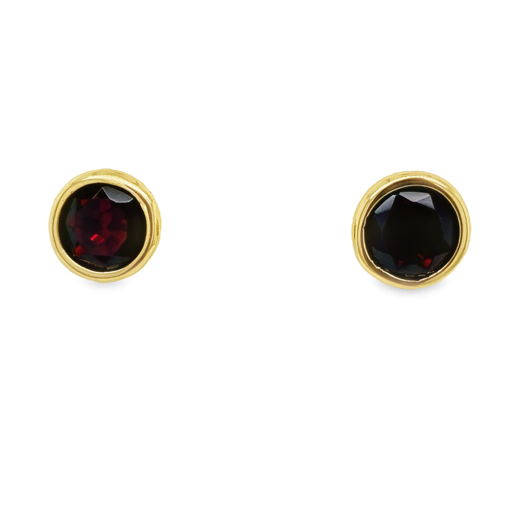 Beautifully crafted in 18k yellow gold, these citrine stud earrings will add a luxurious sparkle to any outfit. The large round garnet are secured with friction backs, ensuring a secure fit that will make you feel confident. Make a bold and sophisticated statement with these stunning earrings!