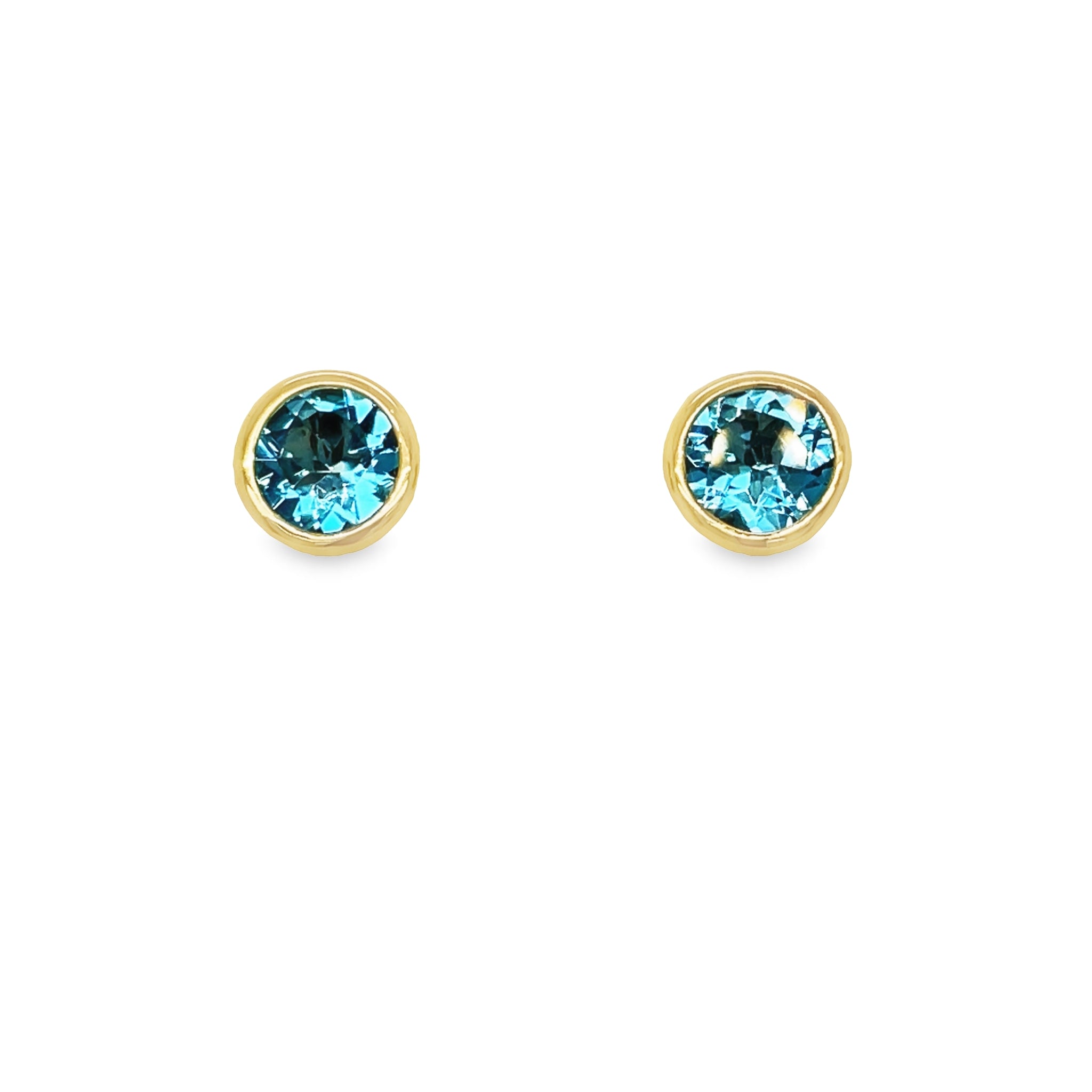 Beautifully crafted in 18k yellow gold, these citrine stud earrings will add a luxurious sparkle to any outfit. The large round blue topaz are secured with friction backs, ensuring a secure fit that will make you feel confident. Make a bold and sophisticated statement with these stunning earrings!