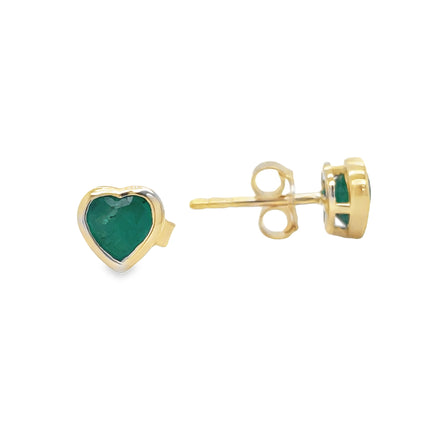 Add a touch of elegance to any outfit with our Dainty Emerald Heart Stud Earrings. The heart-shaped emeralds, set in 14k yellow gold, make a classic and sophisticated statement. The secure friction backs ensure your earrings stay in place all day. Make a statement with these stunning and versatile earrings!