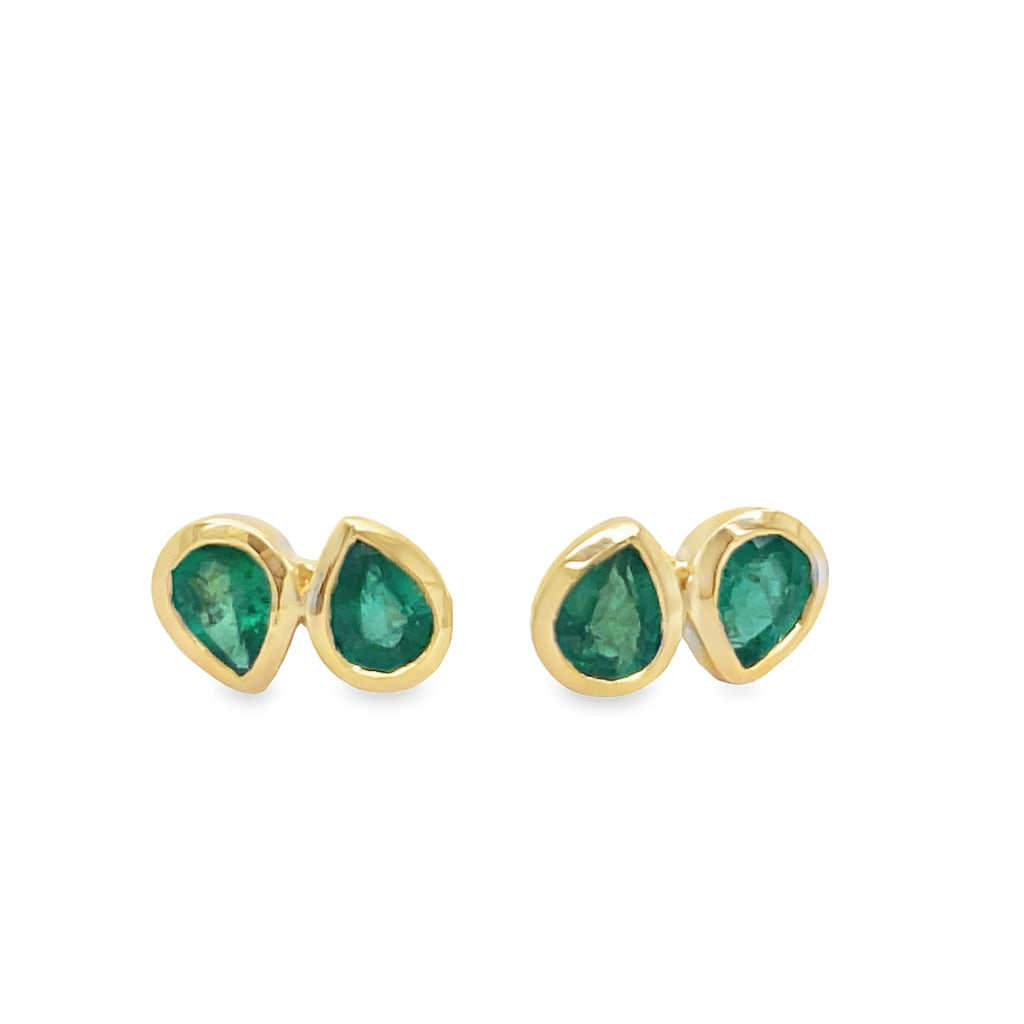 Add a touch of elegance to any outfit with our Dainty Double Emerald Stud Earrings. The double-shaped emeralds, set in 14k yellow gold, make a classic and sophisticated statement. The secure friction backs ensure your earrings stay in place all day. Make a statement with these stunning and versatile earrings!