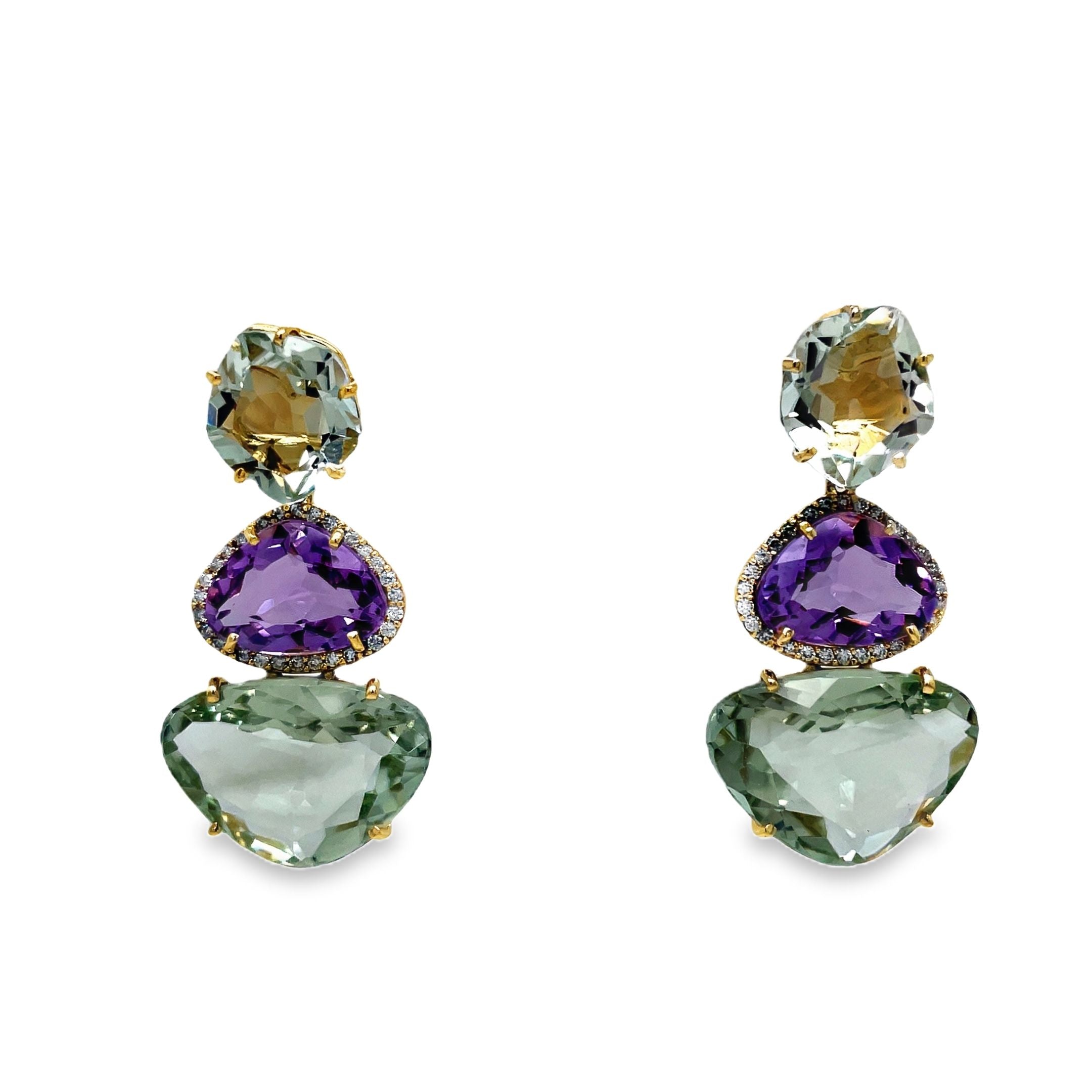 ndulge in decadent luxury with our 18k yellow gold drop earrings. Crafted in Brazil, the trillian cut amethyst and large Praziolite gems are elegantly accented with round diamonds. Complete with secure friction backs, these earrings exude sophistication and exclusivity. Elevate your style and make a statement with these stunning earrings.