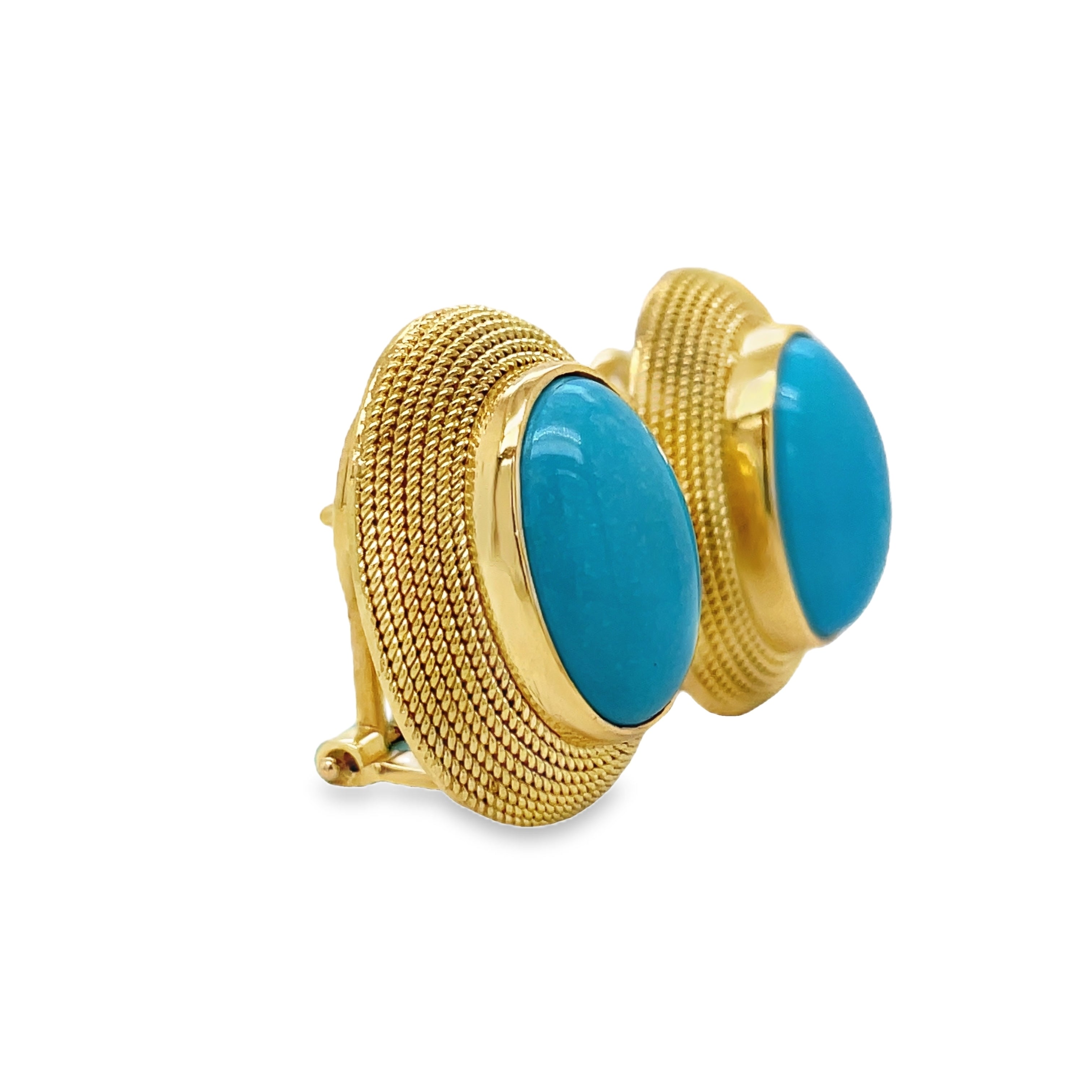 ndulge in luxury with our 18k Italian Made Turquoise Cabochon Earrings. Adorned with stunning 20 x 16.00 mm cabochon turquoise, these earrings are securely fastened with omega clips and flaunt a striking matte finish. Elevate your style with these sophisticated and exclusive earrings.