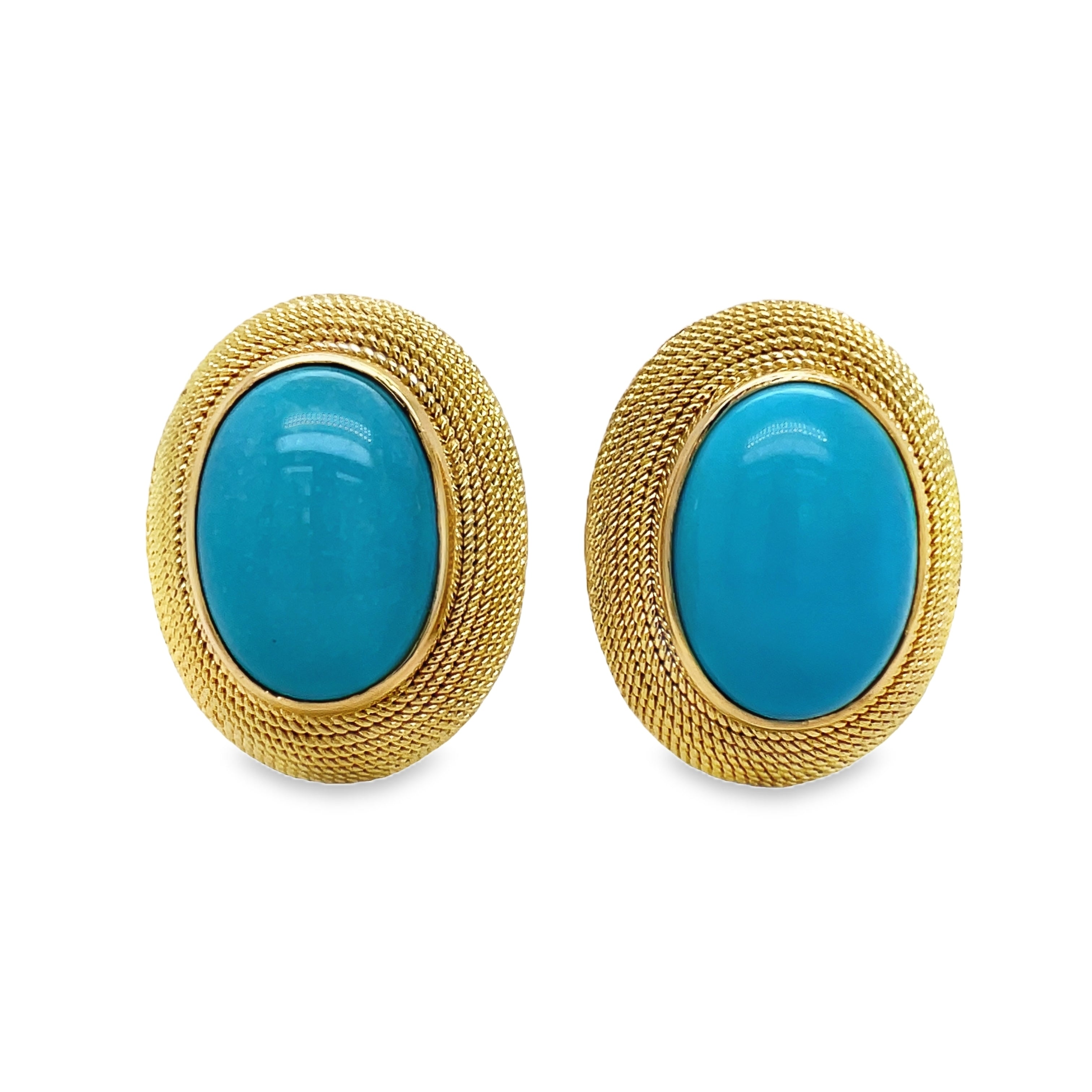 ndulge in luxury with our 18k Italian Made Turquoise Cabochon Earrings. Adorned with stunning 20 x 16.00 mm cabochon turquoise, these earrings are securely fastened with omega clips and flaunt a striking matte finish. Elevate your style with these sophisticated and exclusive earrings.