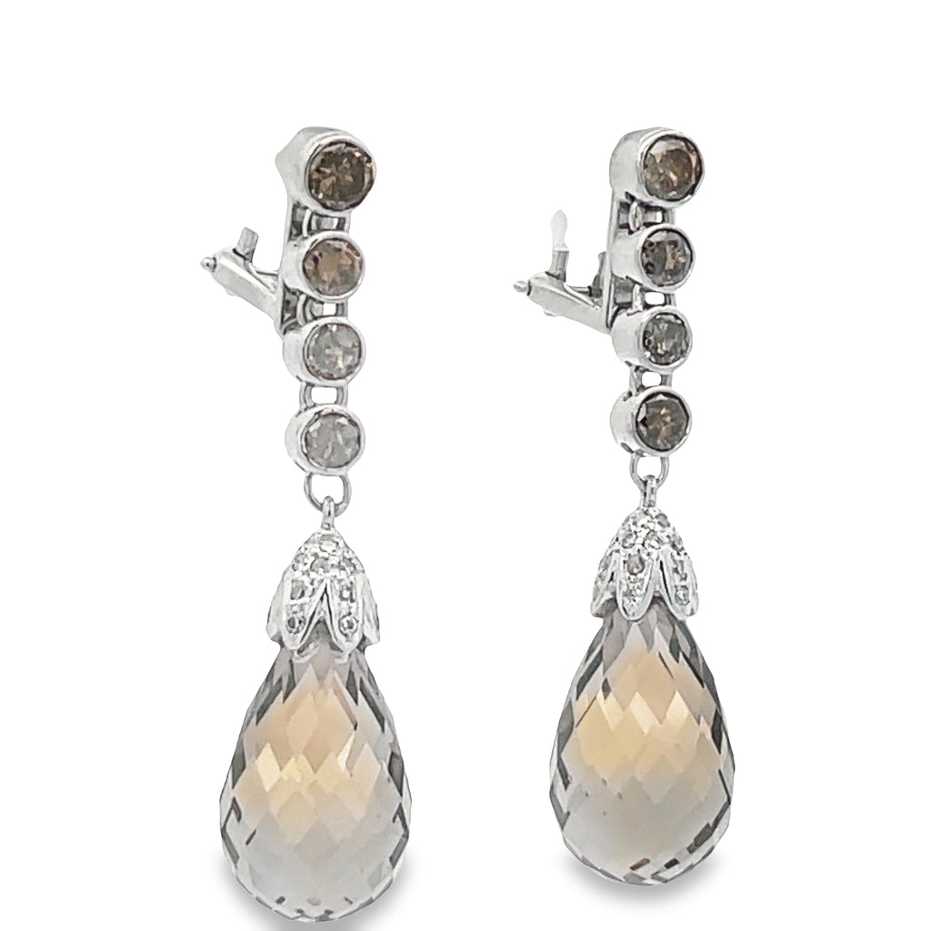 Transform your look with these elegant earrings, featuring sparkling round cognac diamonds 0.45 cts and briolette smokey topaz set in 18K white gold. Make a statement with these stunning drop earrings, perfect for any occasion. Dare to be bold!