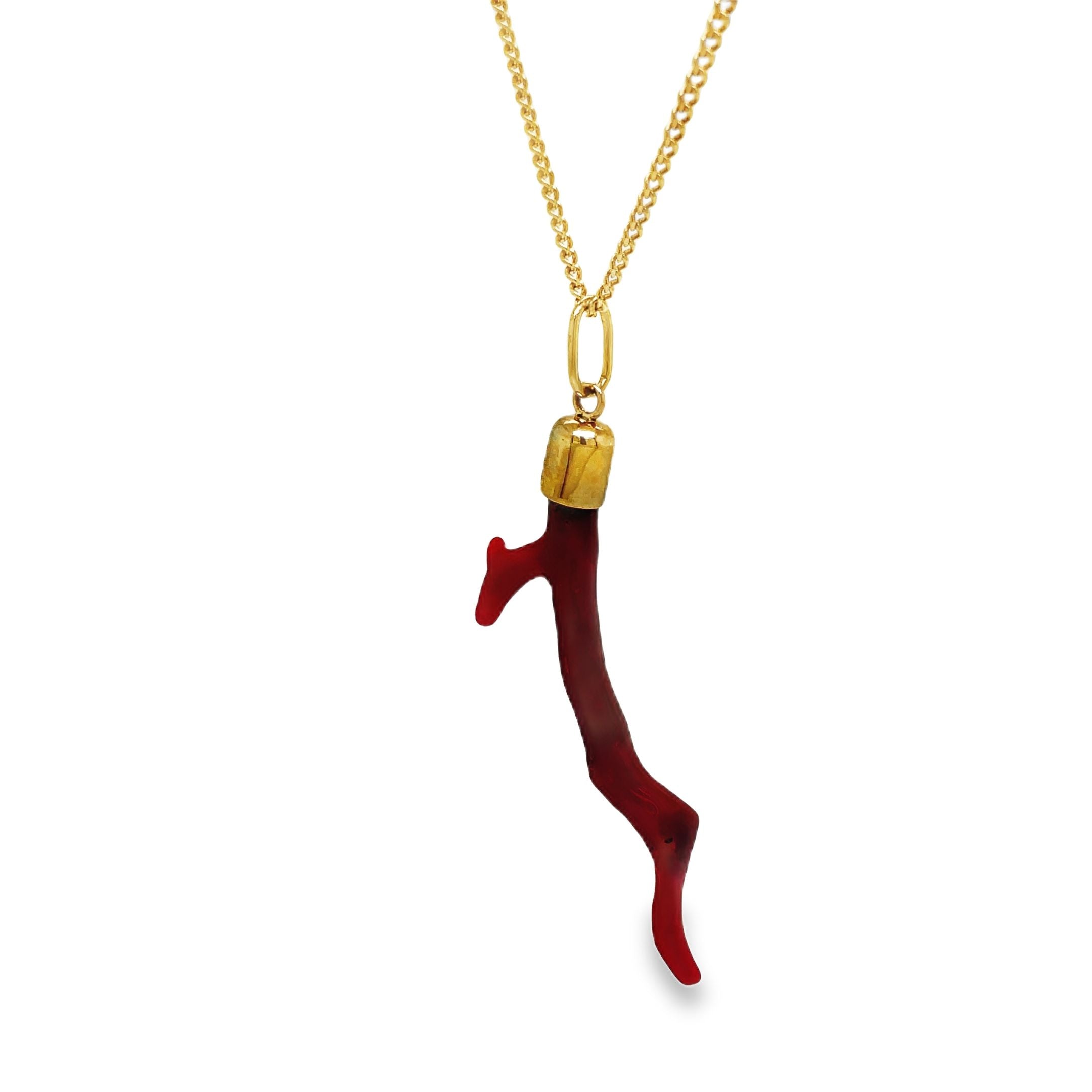 Add a touch of luxury to any outfit with our handmade 18k yellow gold cap pendant necklace featuring a natural red coral branch. This exclusive necklace evokes the beauty of the ocean and embodies the sophistication of our brand. Elevate your style with this elegant and timeless piece.

Chain sold separately $599.00 rolo chain